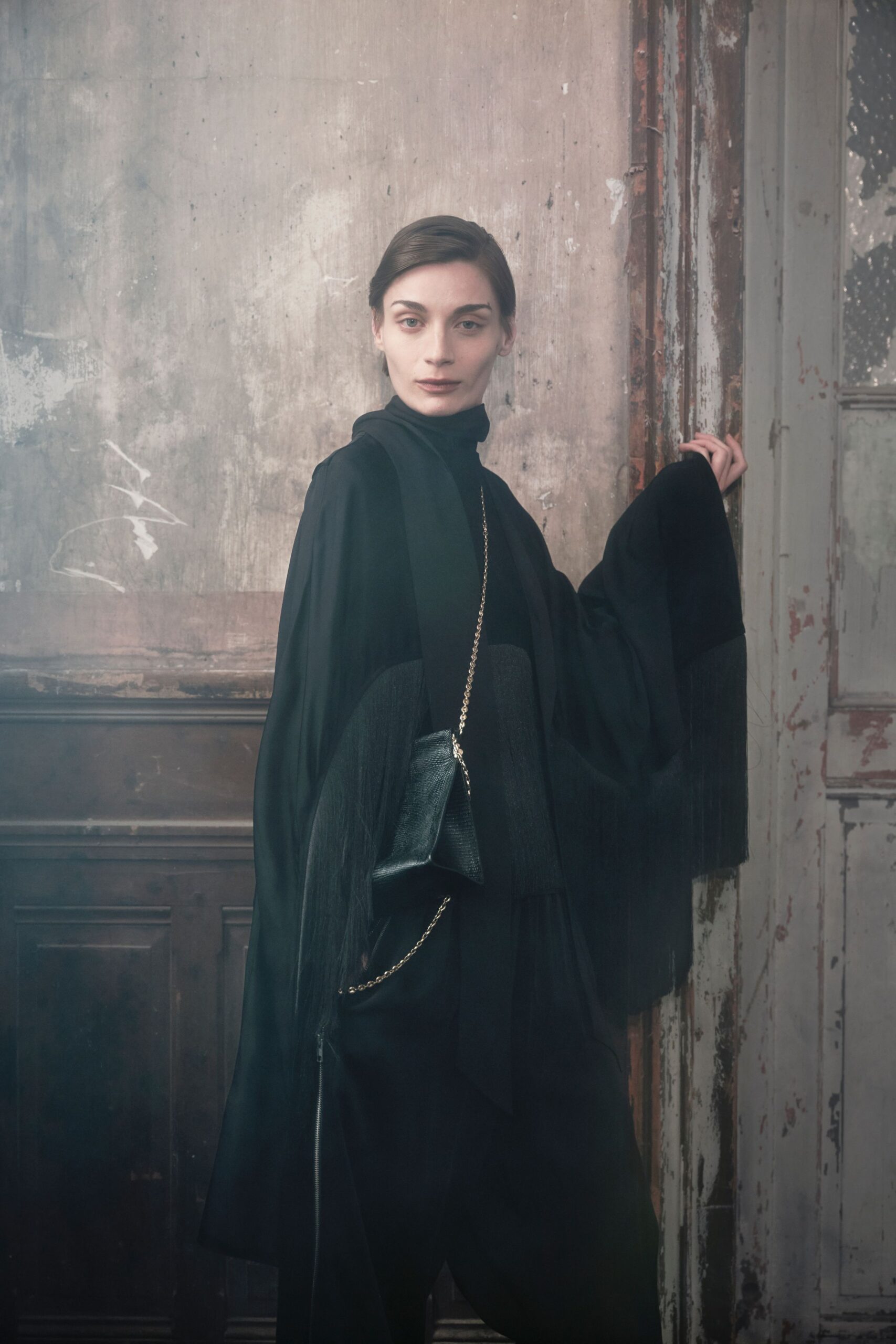 black silk long-sleeve high-neck relaxed fringed cape