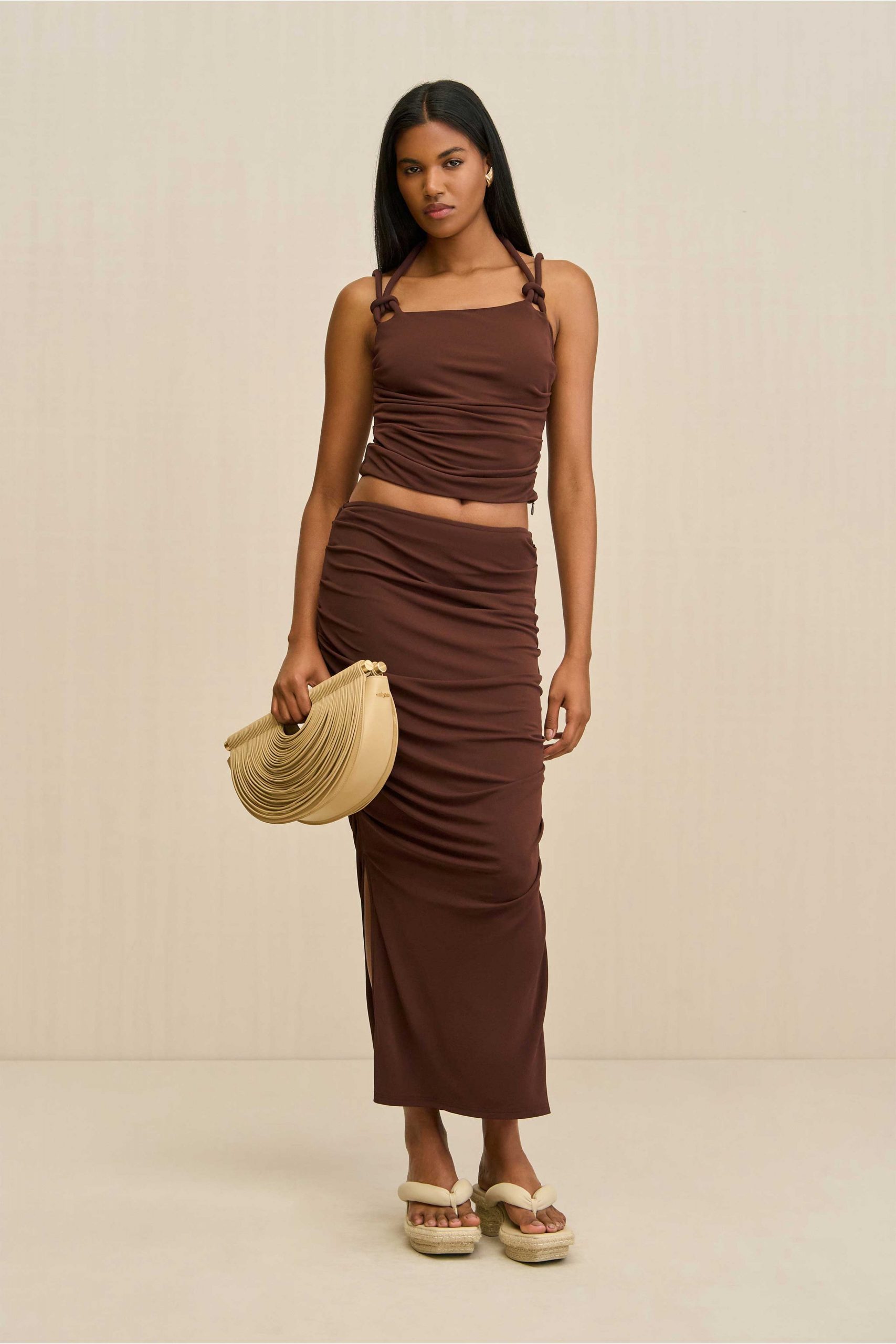 beige leather pleated bag