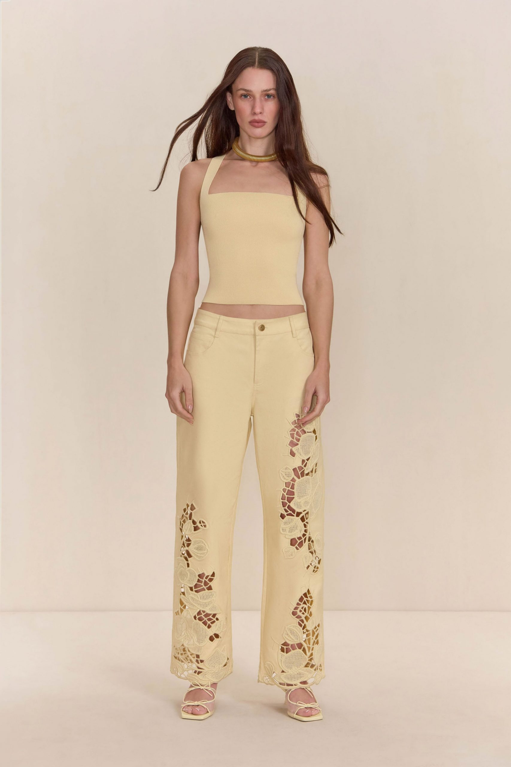 yellow fitted top with relaxed pants