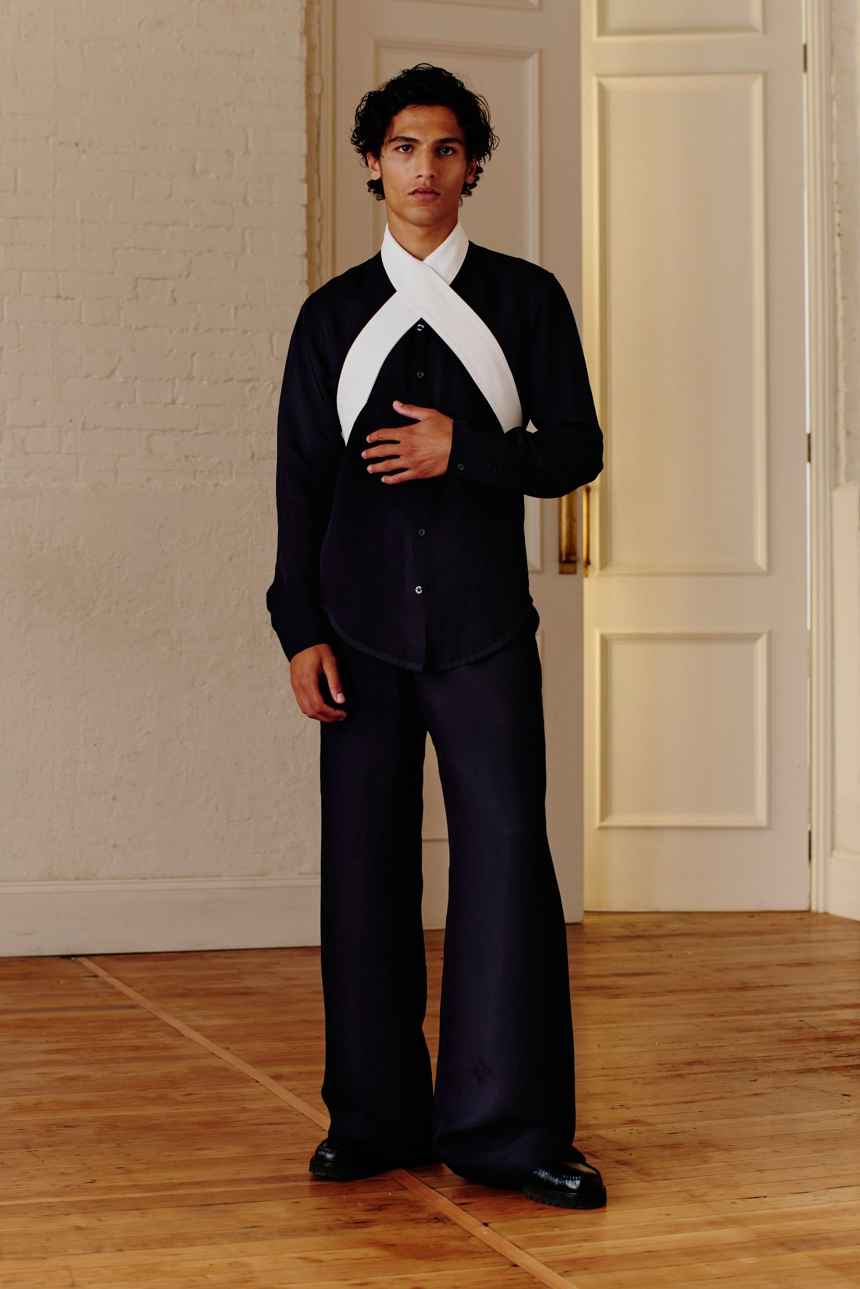 black fitted shirt with white scarf
