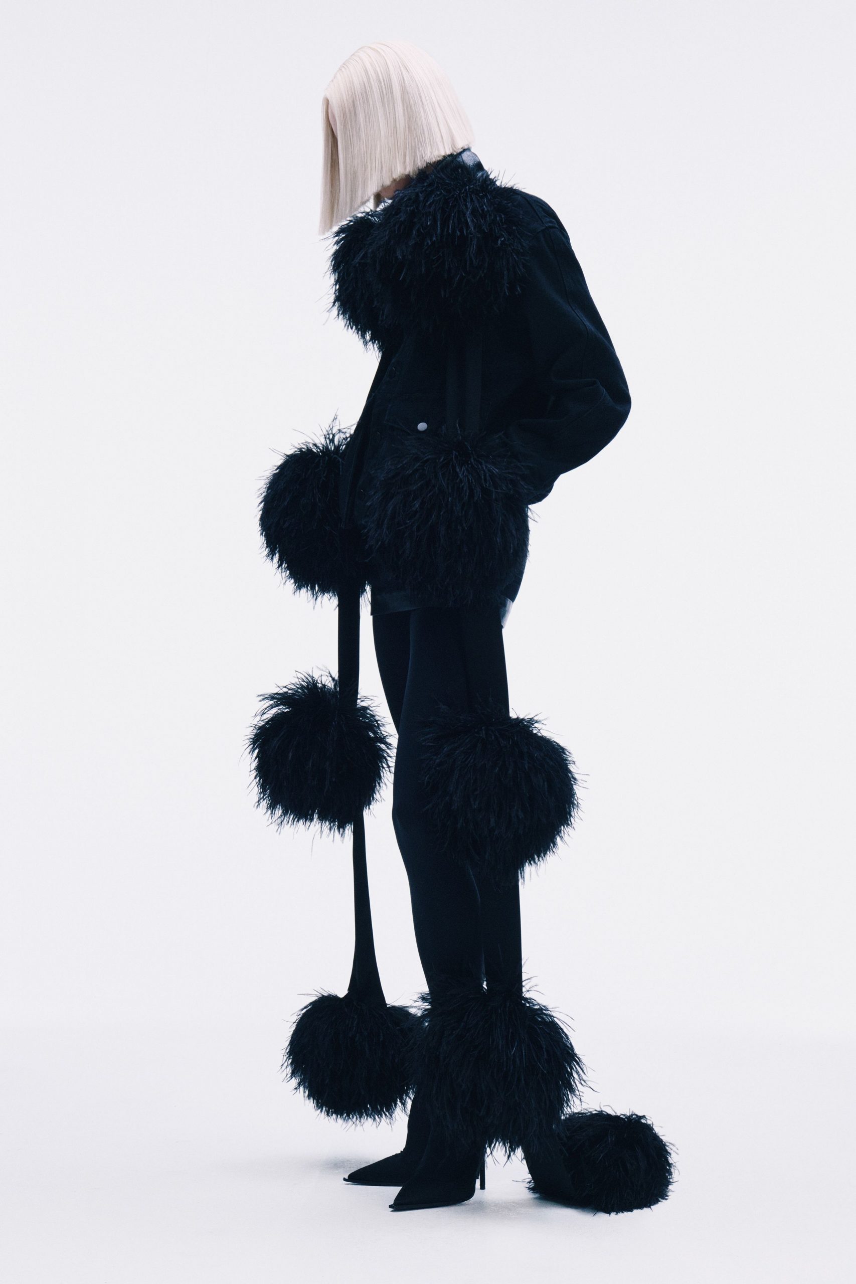 black fringed jacket and pants