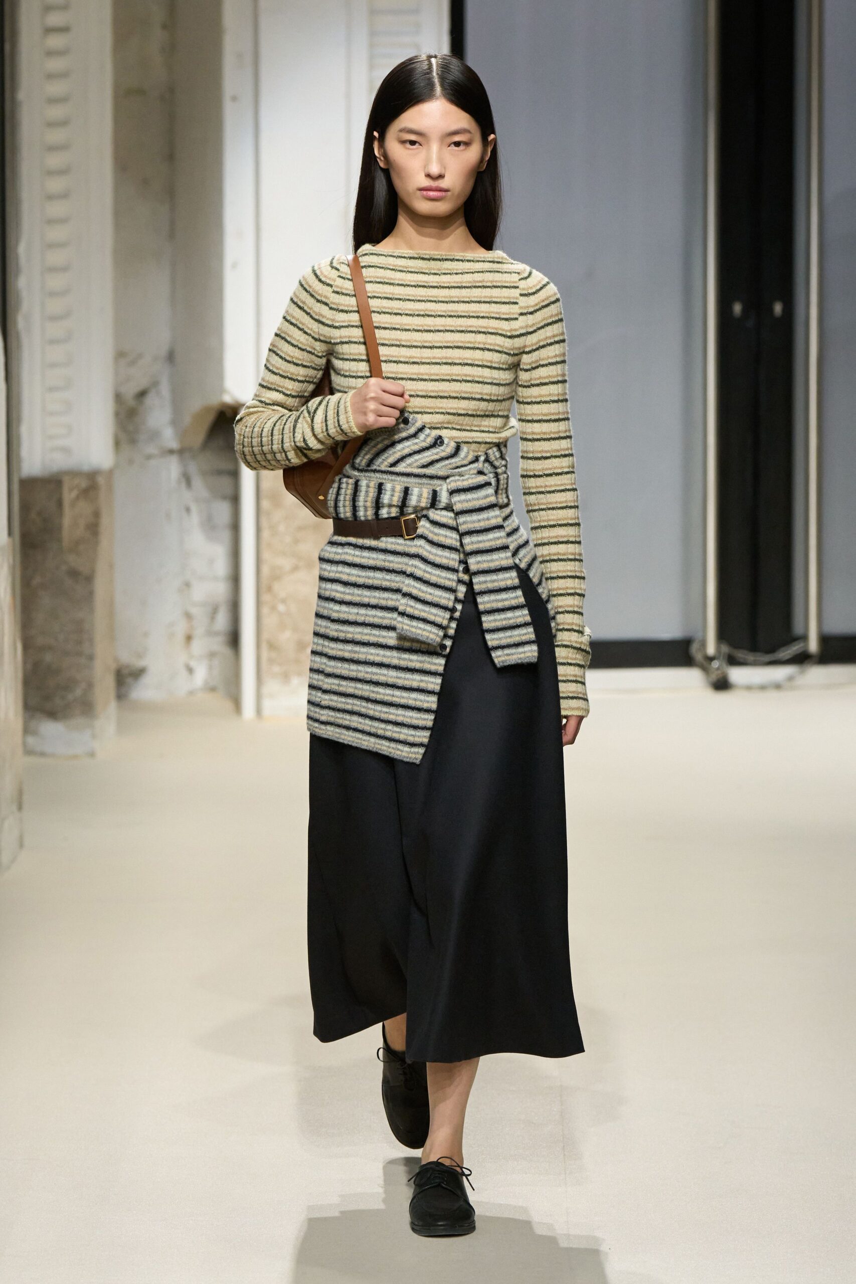 striped top with black skirt