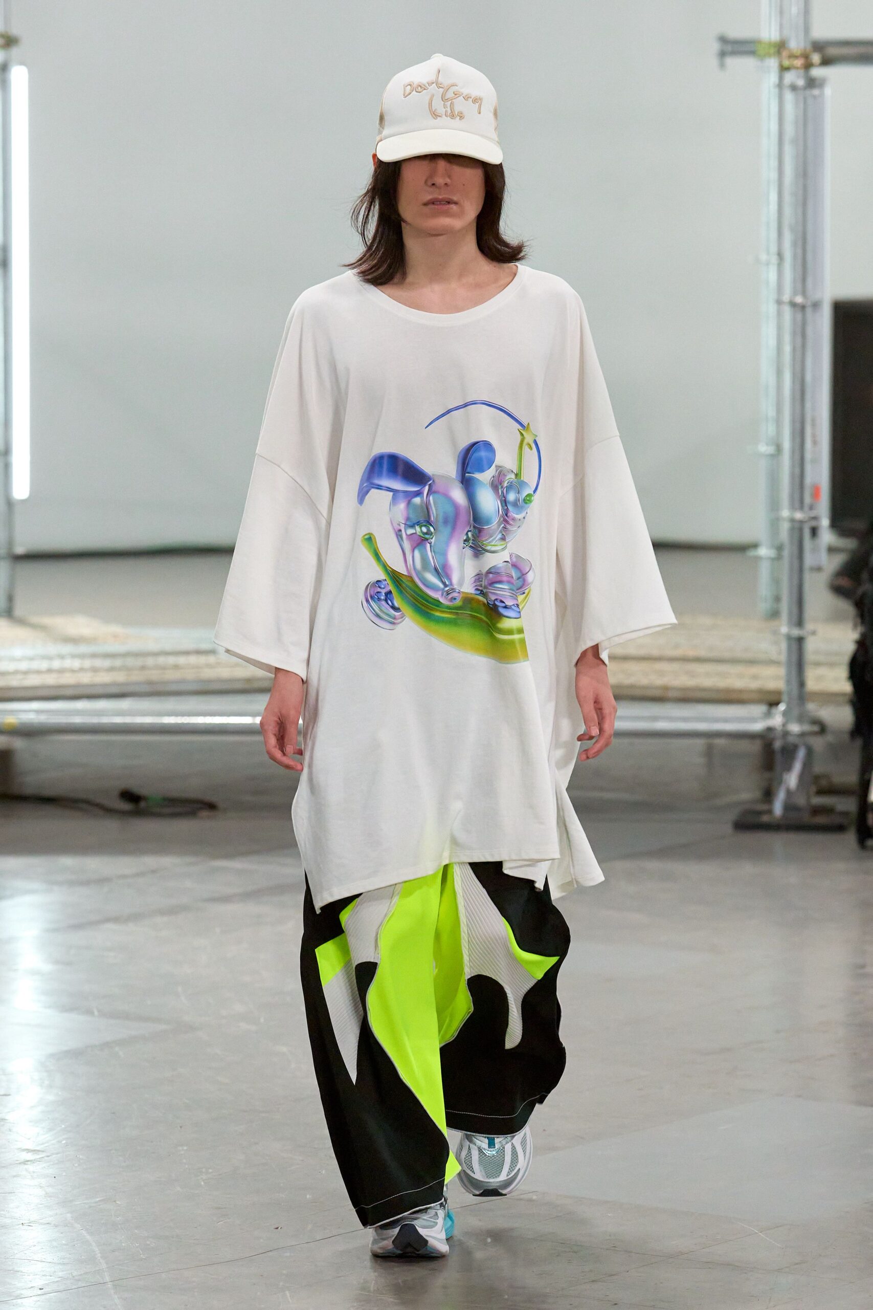 white printed t-shirt with color-blocked pants