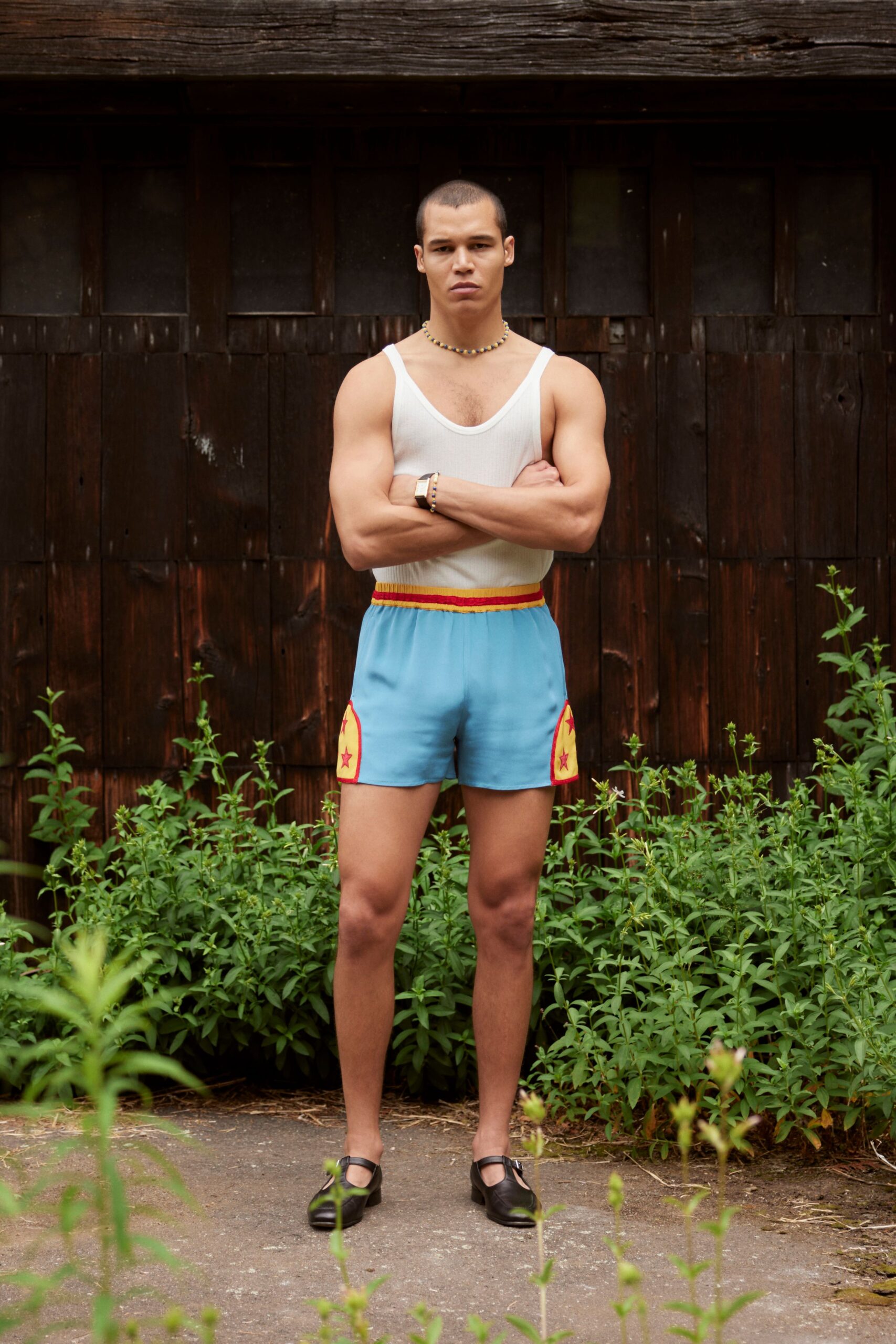 white tank-top blue shorts