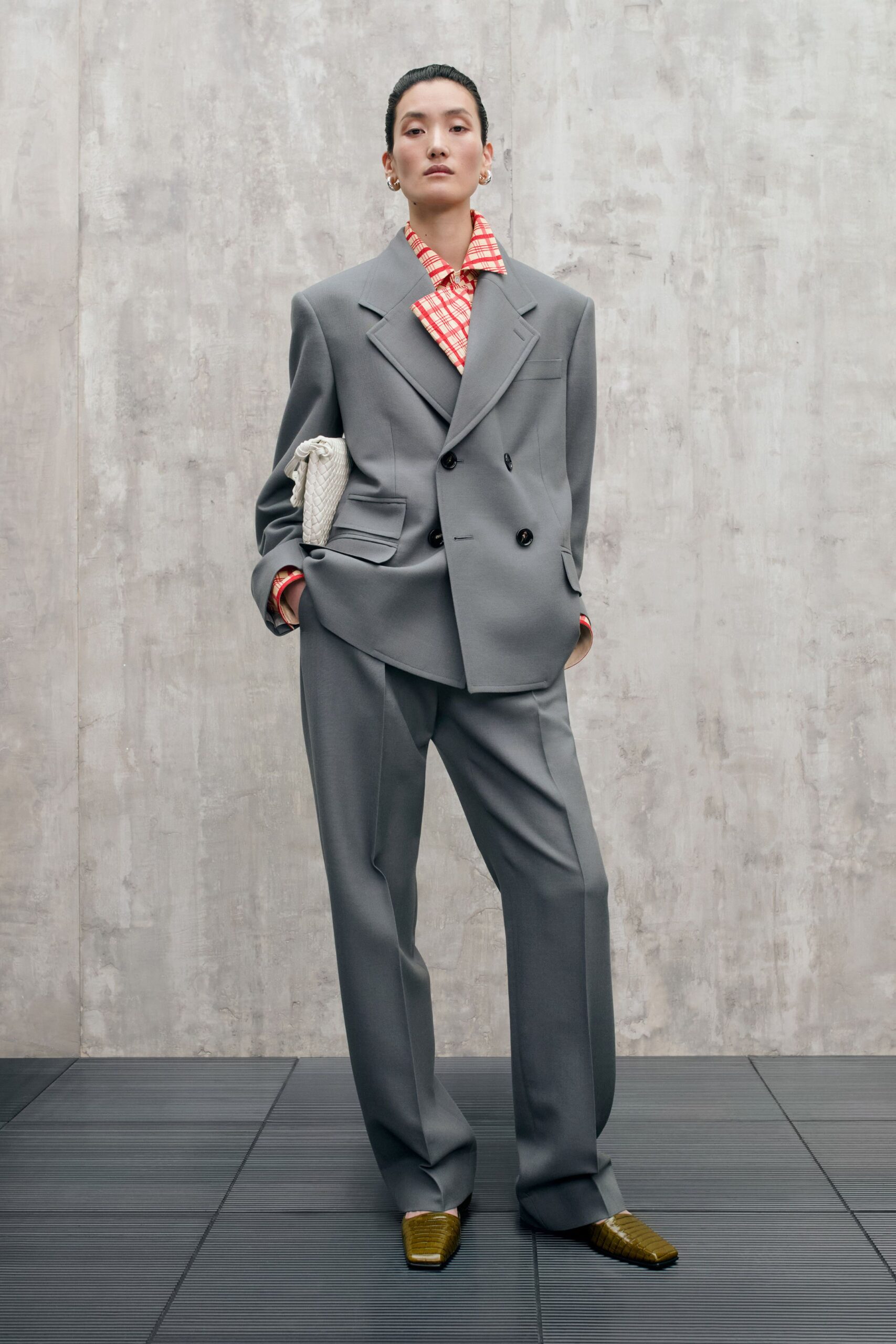 gray tailored suit with checked shirt