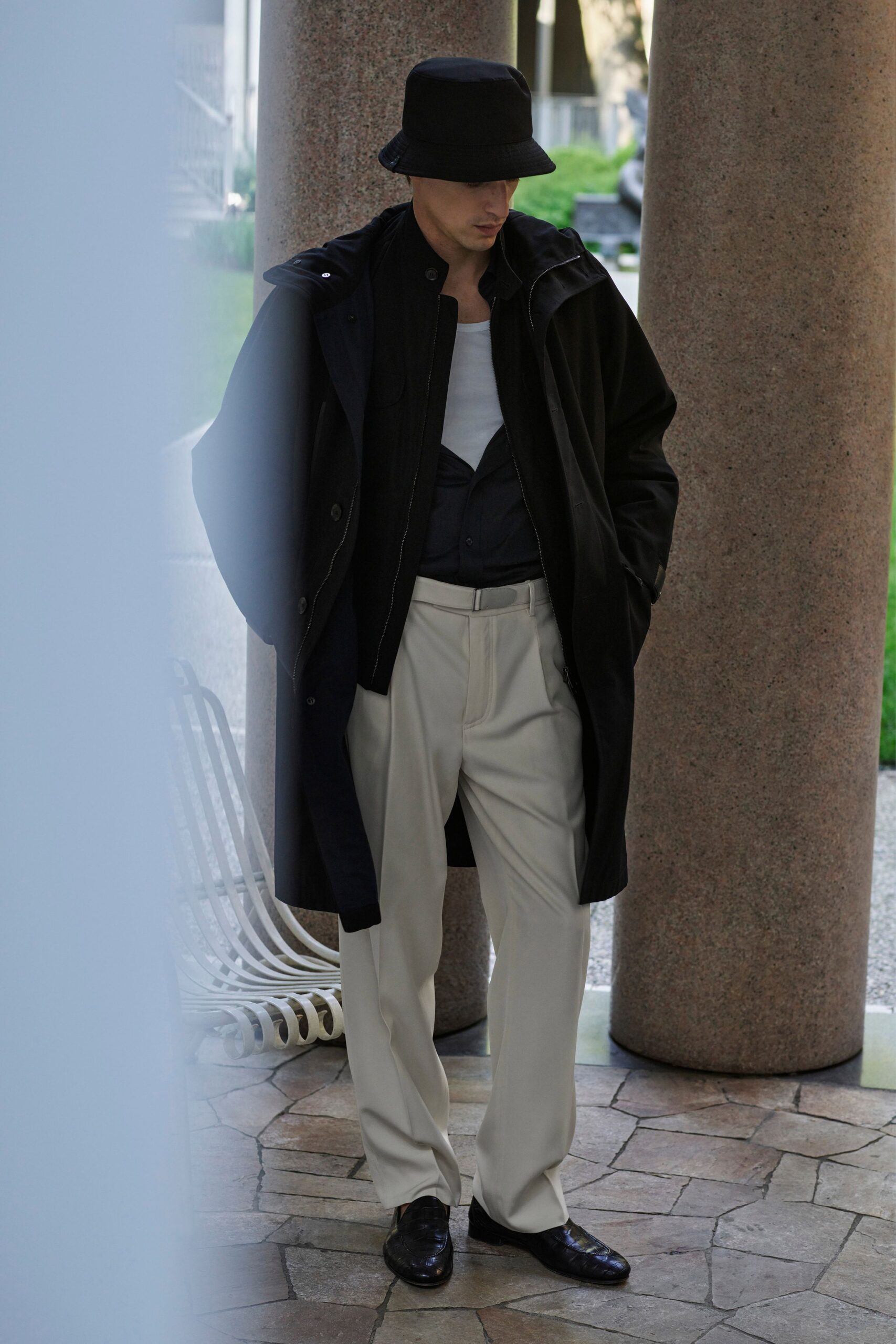black coat with beige pants