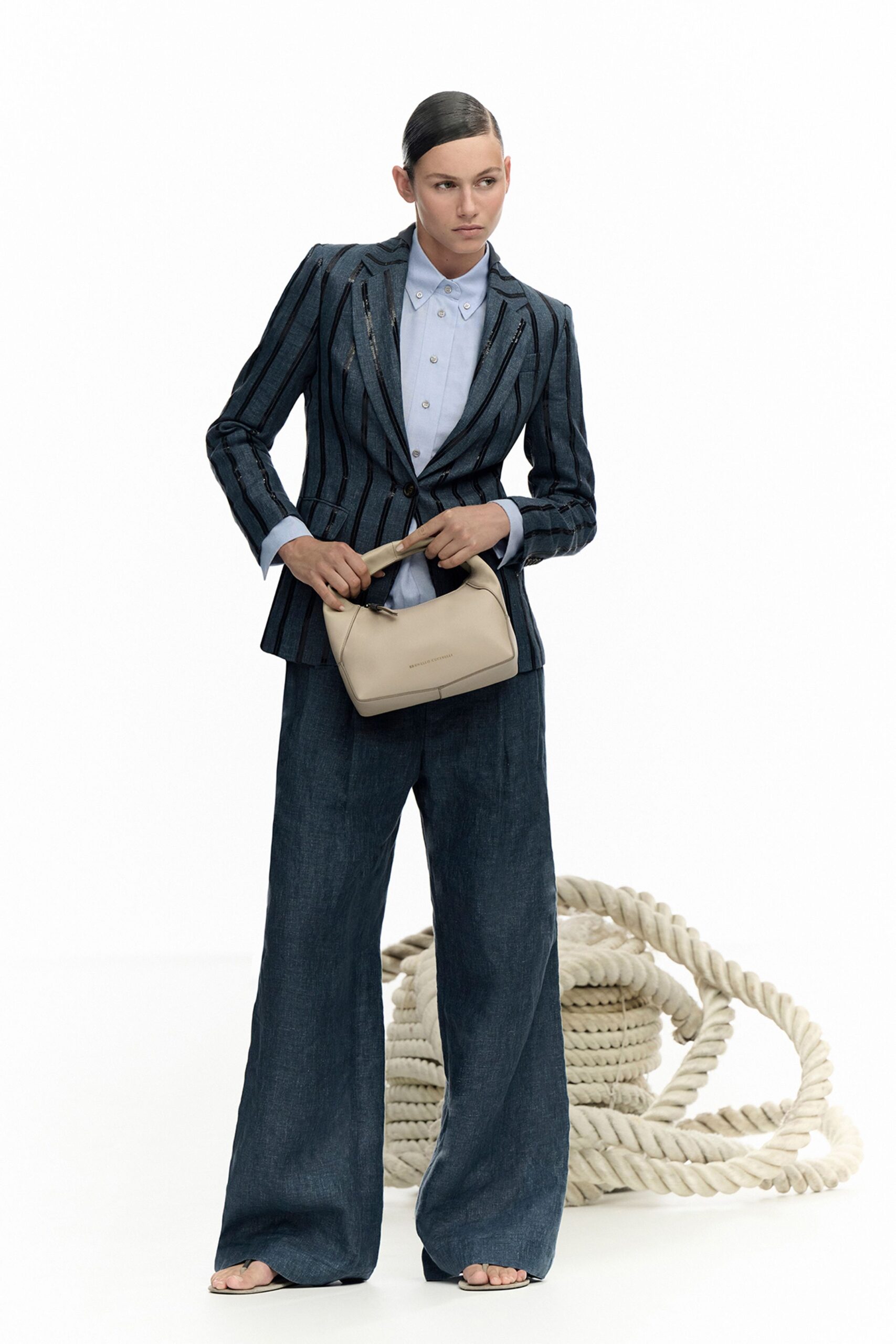 tailored blue striped blazer with denim pants