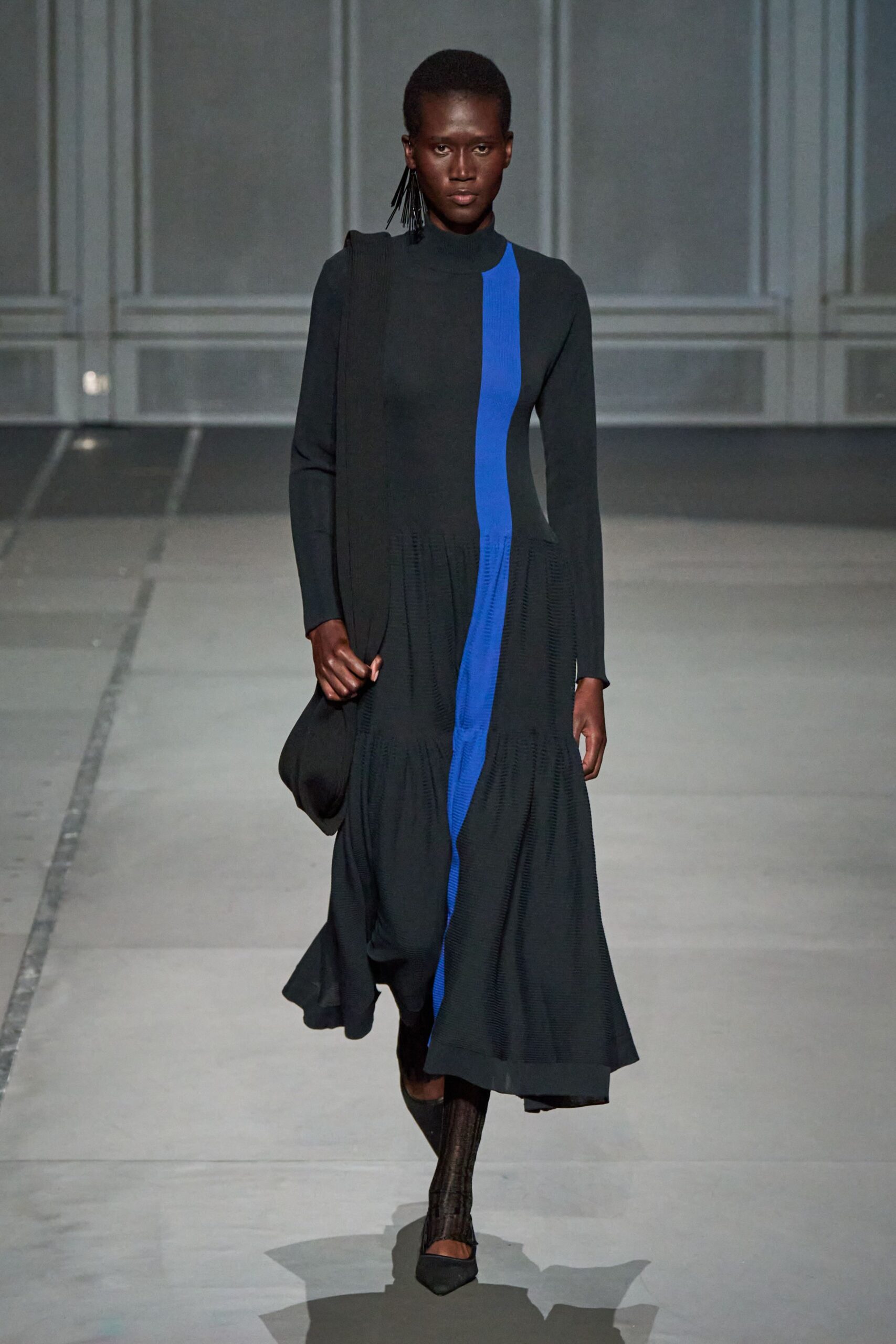black and blue midi dress with bag