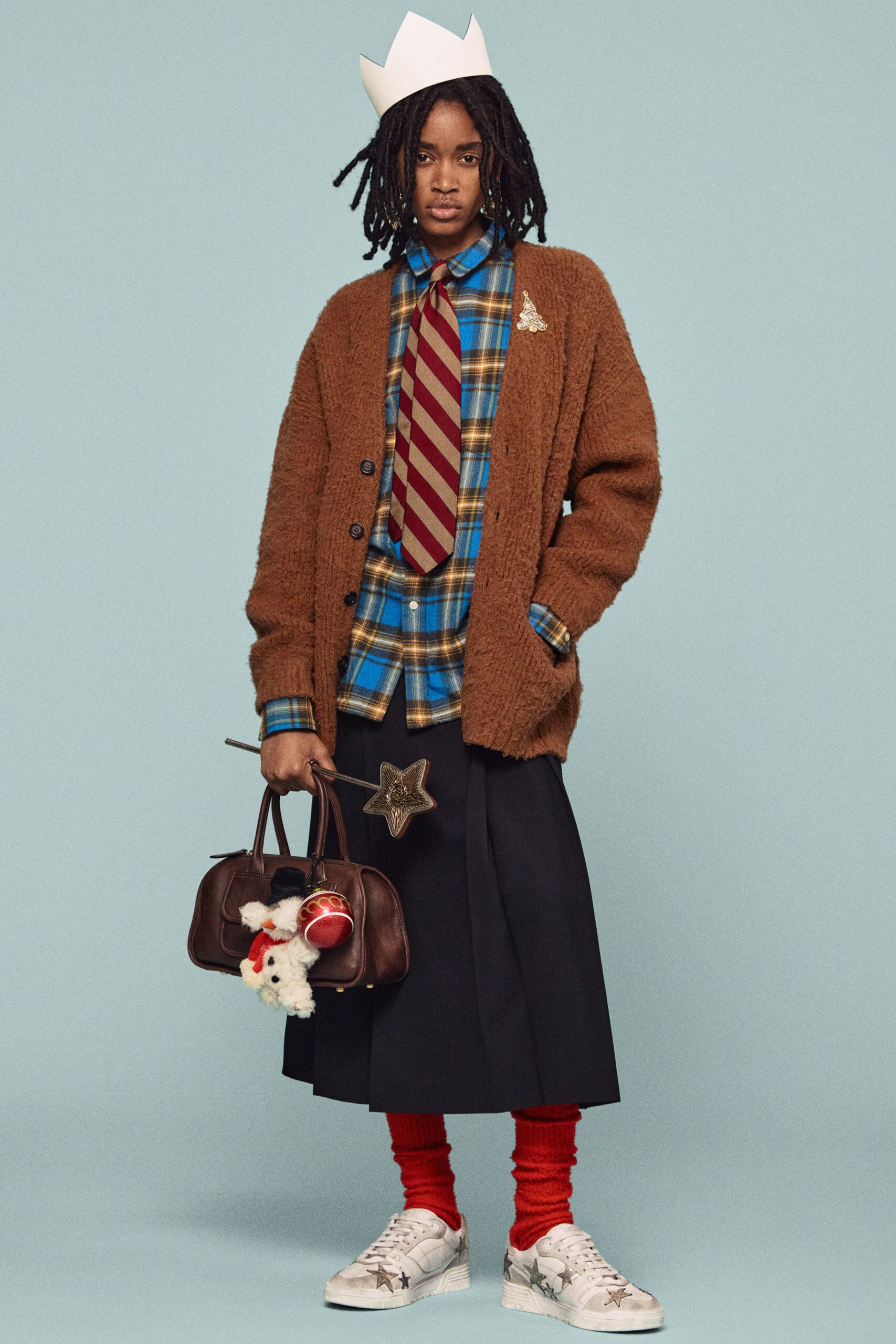 brown cardigan with blue checked shirt