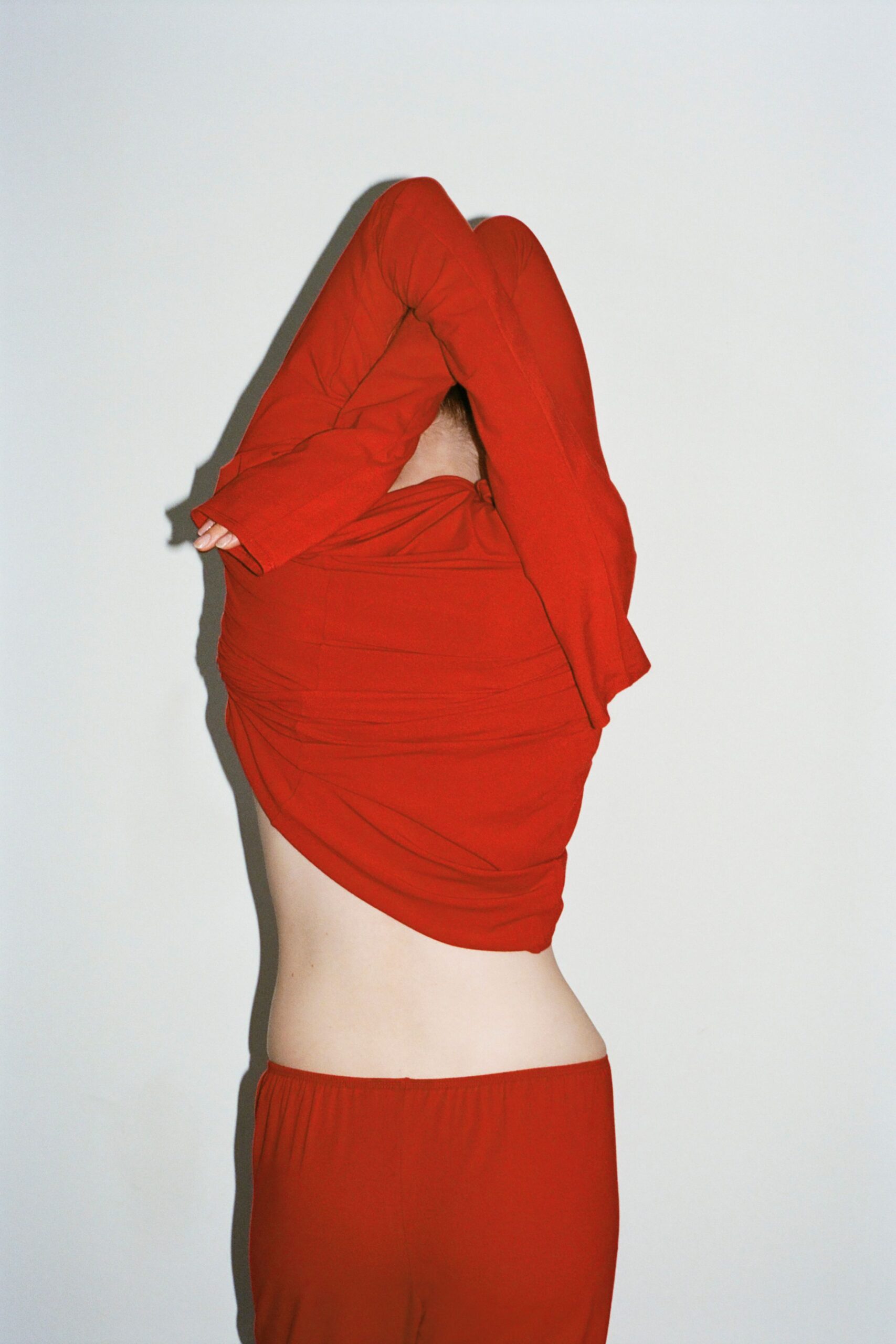 red fitted top and pants