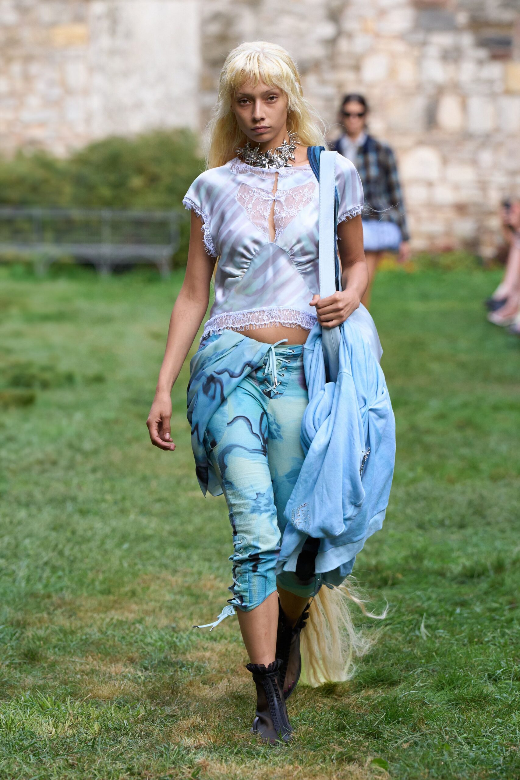 blue silk sleeveless top with printed pants