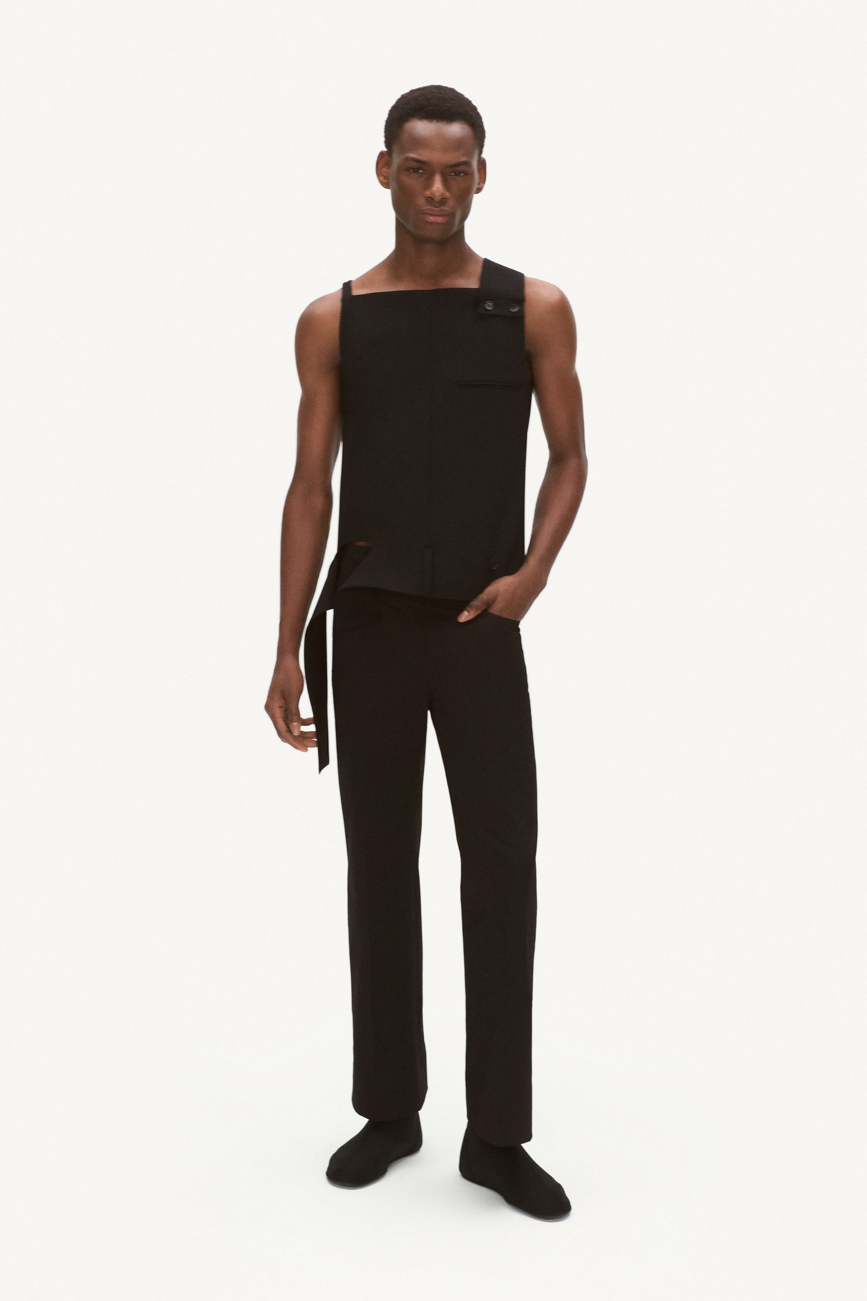 black fitted top and slim pants