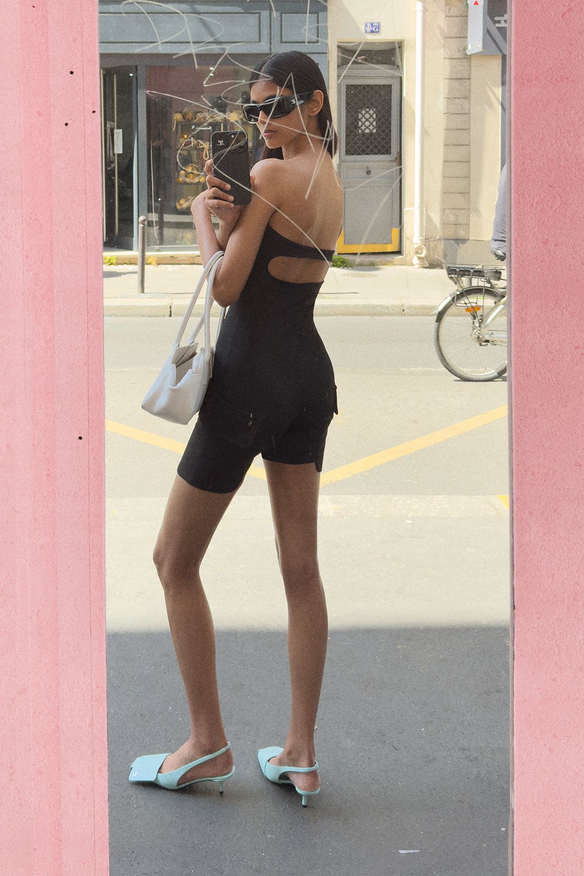 black cotton sleeveless backless fitted zippered romper