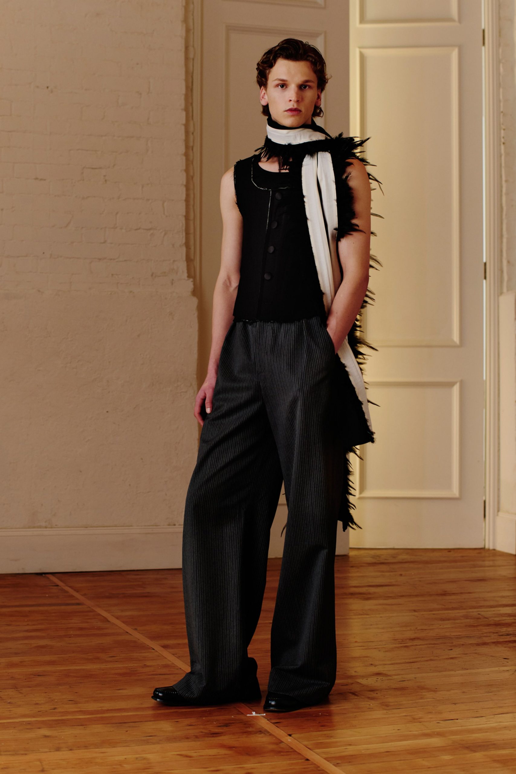 black fitted top gray wide-leg pants