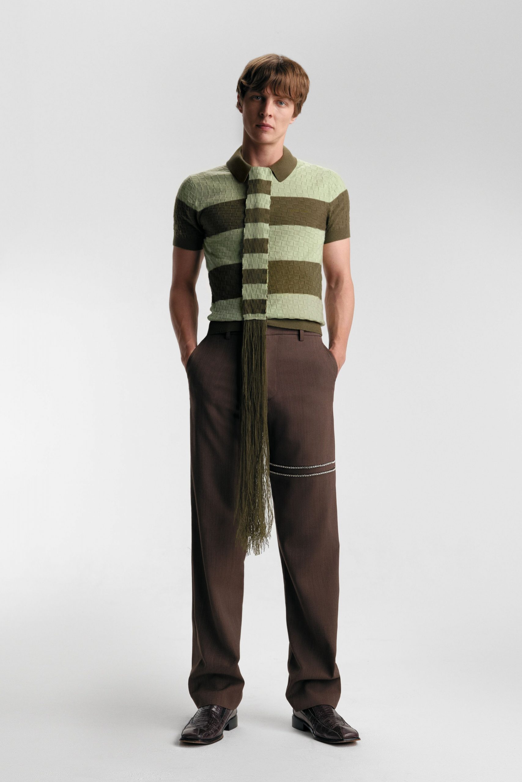 green and brown striped top with tailored pants
