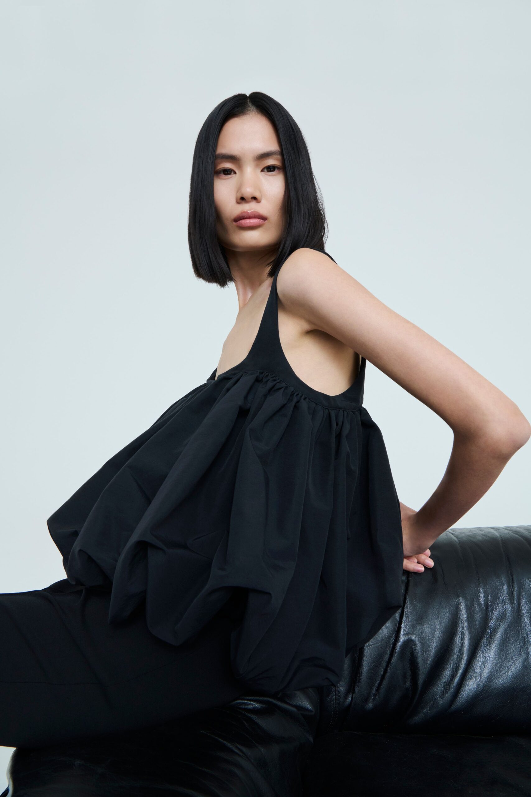 black relaxed top and fitted pants
