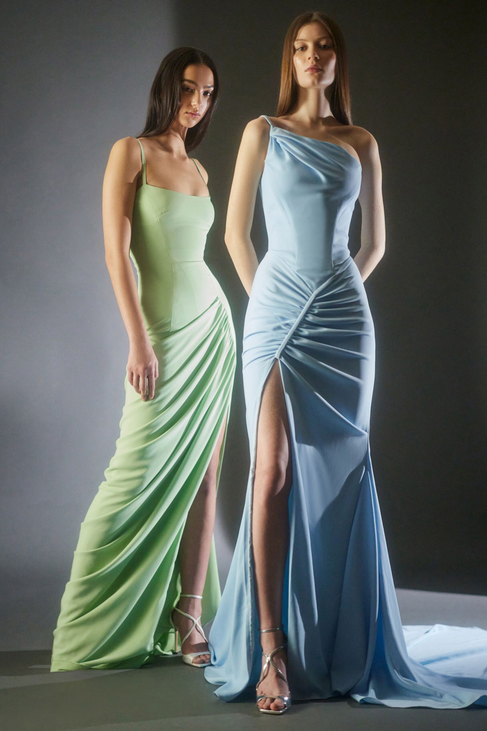 blue silk sleeveless off-shoulder fitted ruched maxi gown