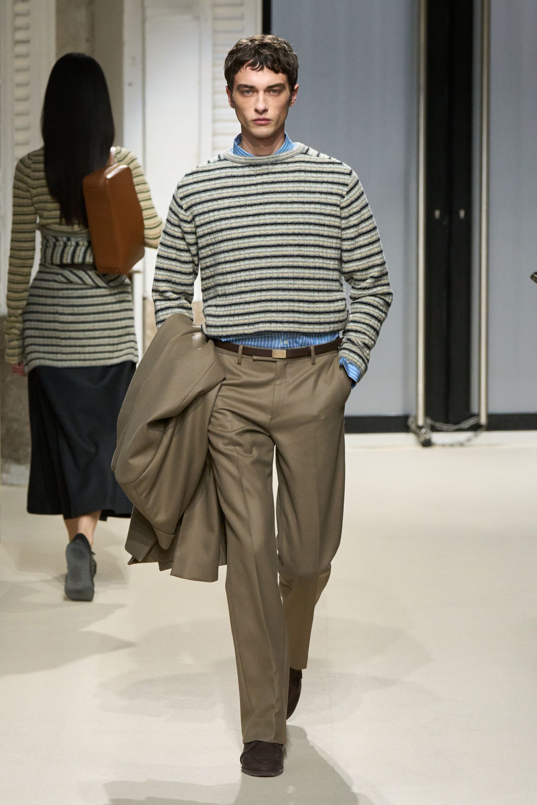 striped sweater beige pants jacket