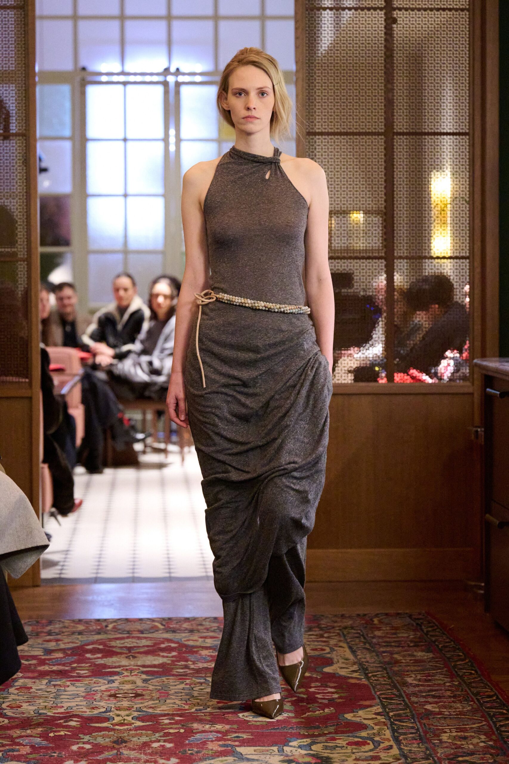 gray silk sleeveless high-neck fitted draped flowing dress