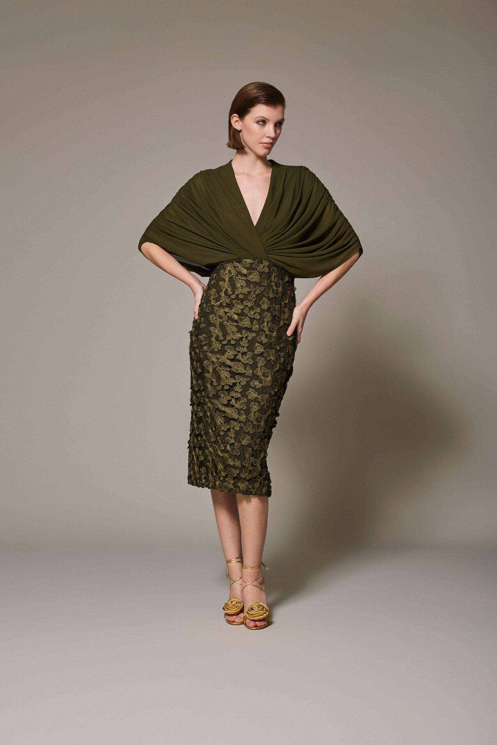green silk sleeveless v-neck fitted pleated embroidered dress