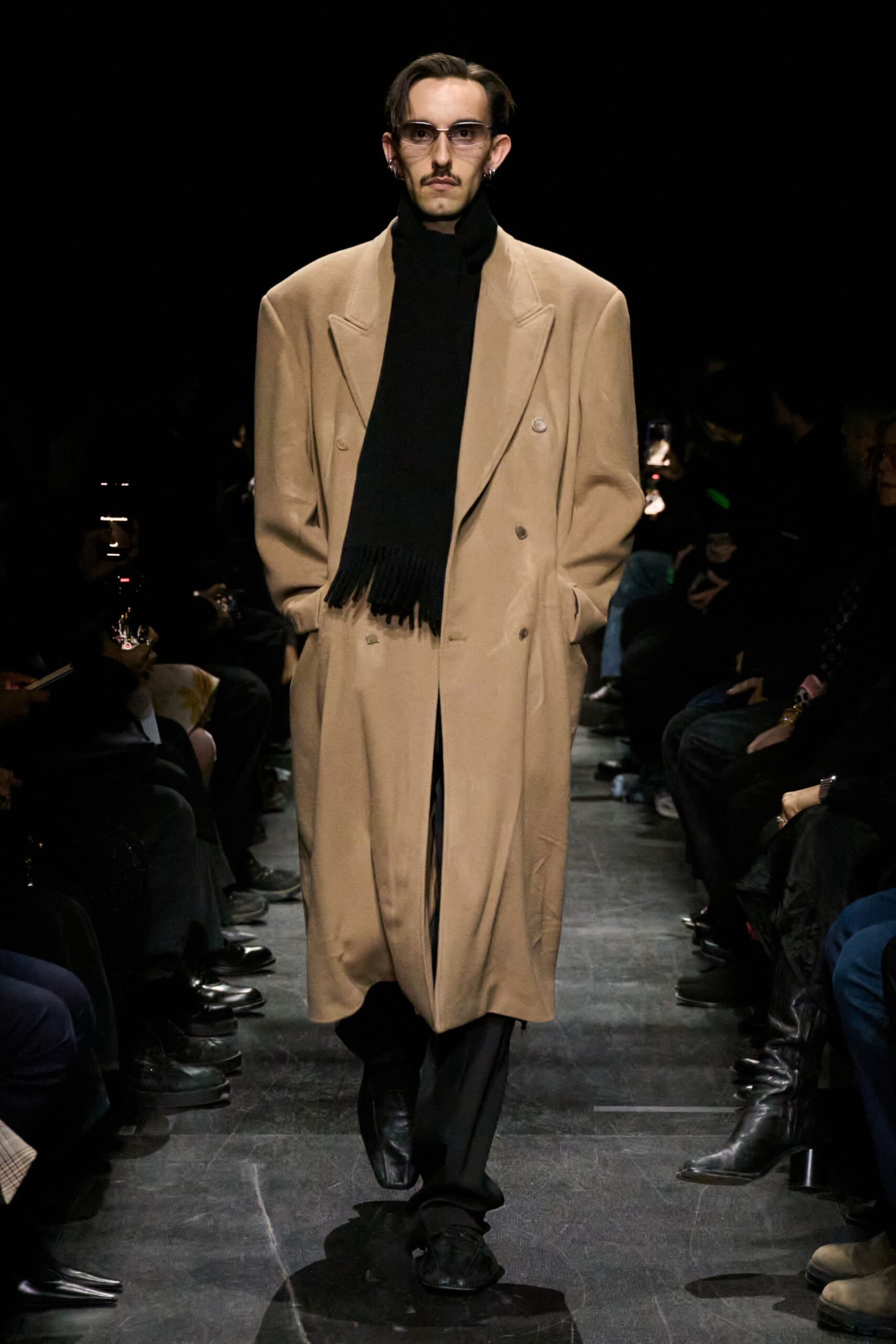 beige oversized coat with black scarf