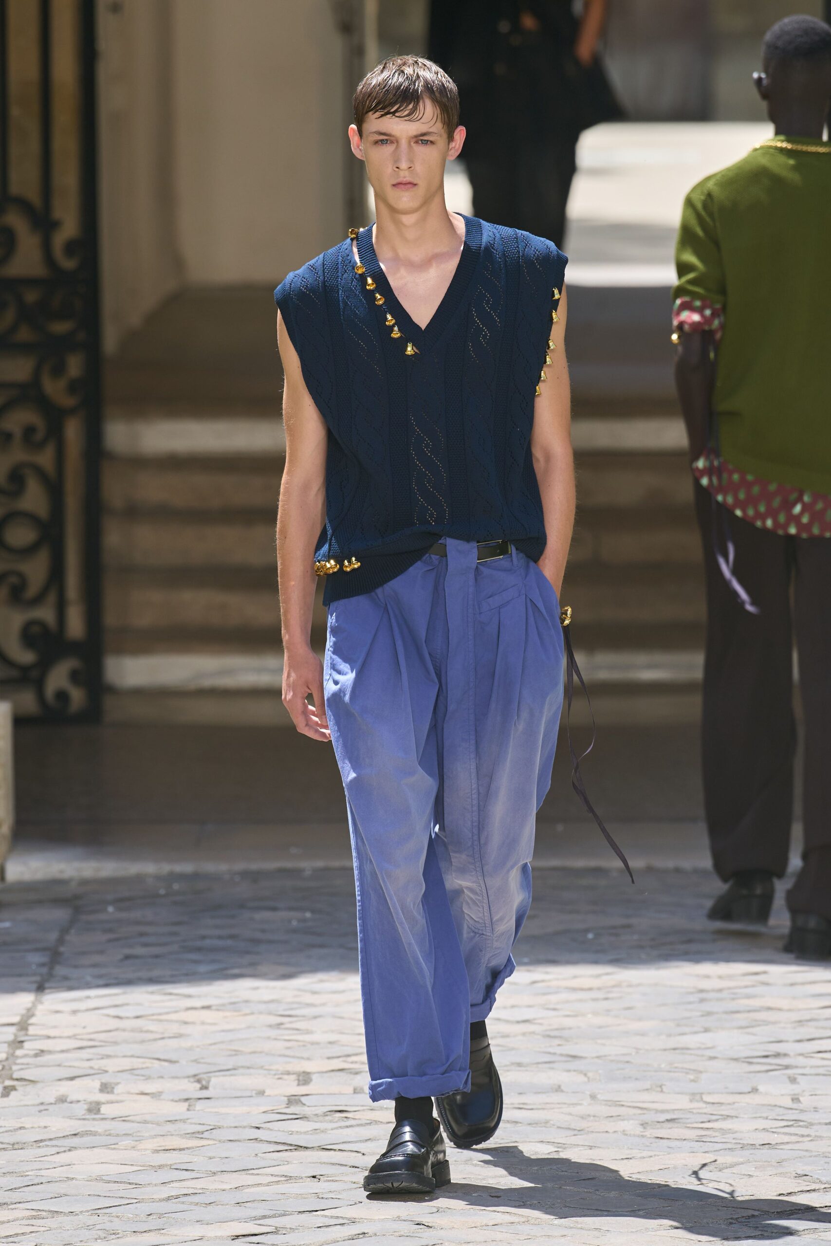blue relaxed top with pleated pants
