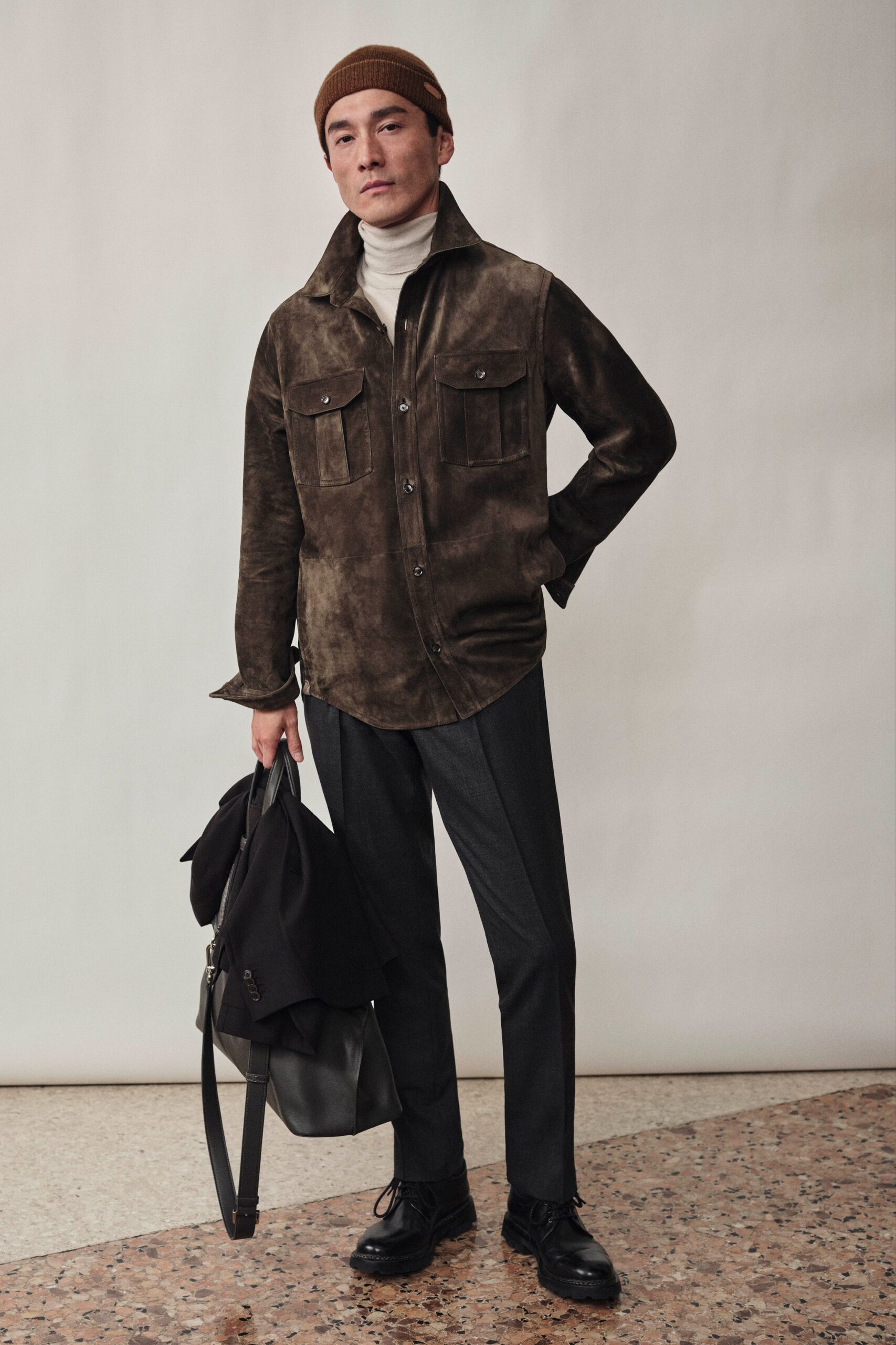 brown suede jacket with gray pants
