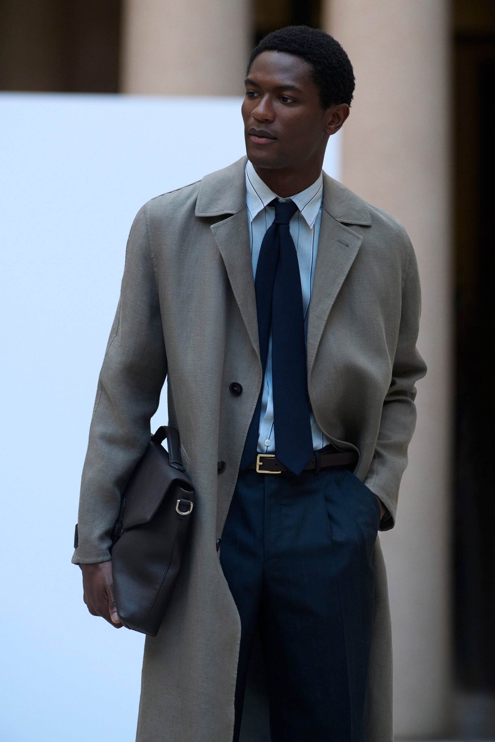 beige wool coat with navy pants
