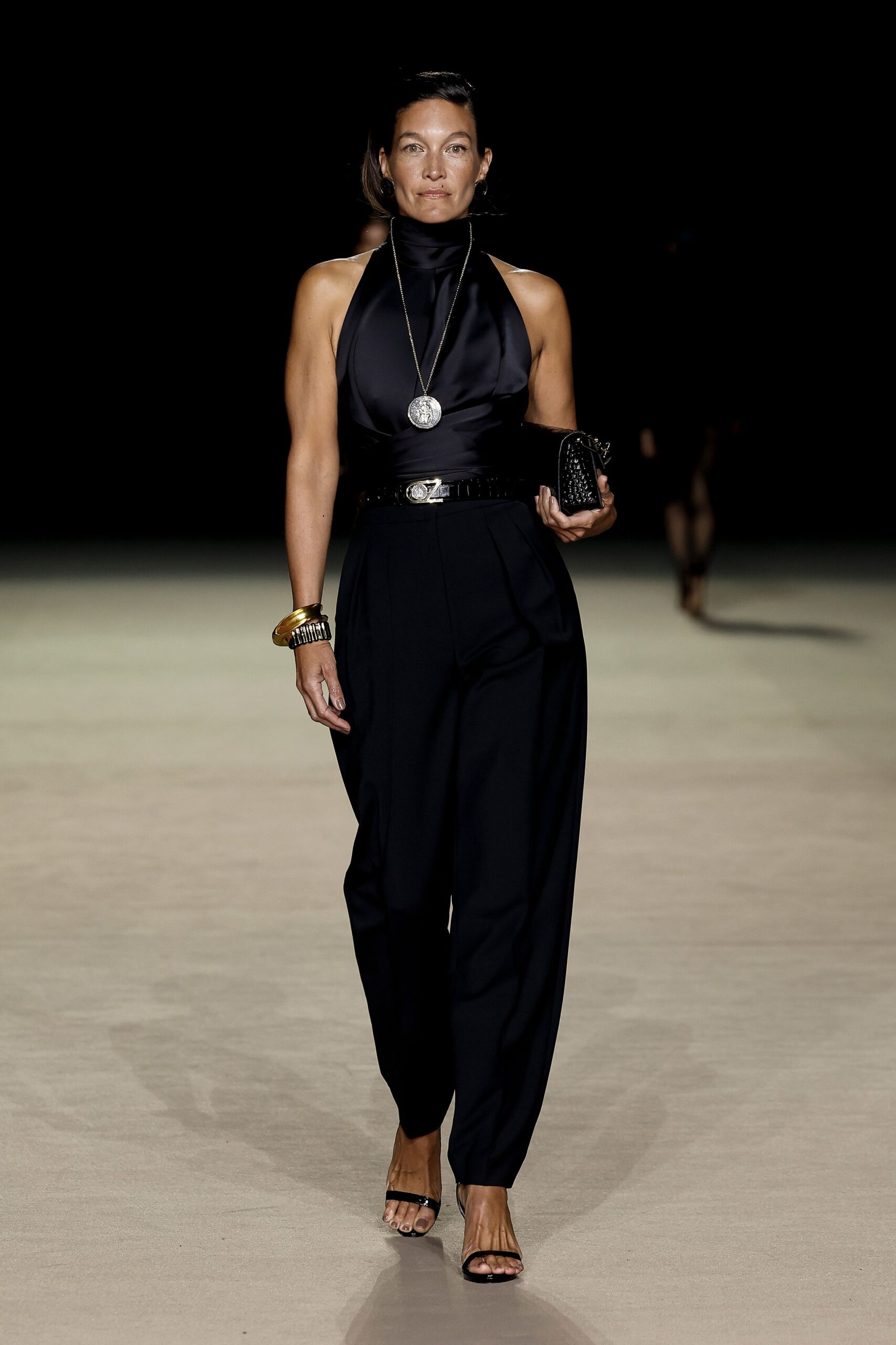 black silk top and relaxed pants