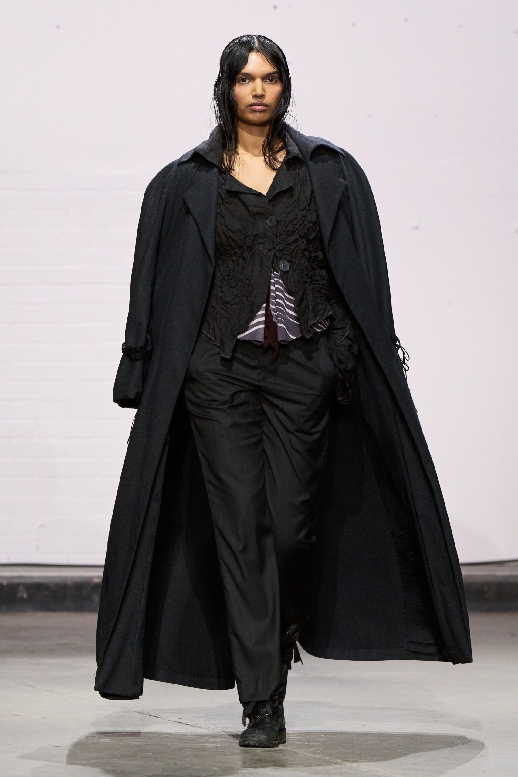black wool coat with fitted top