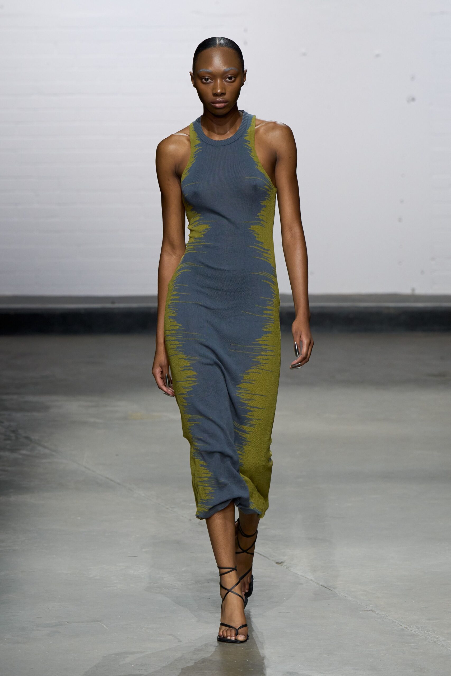 fitted blue and green midi dress with strappy shoes