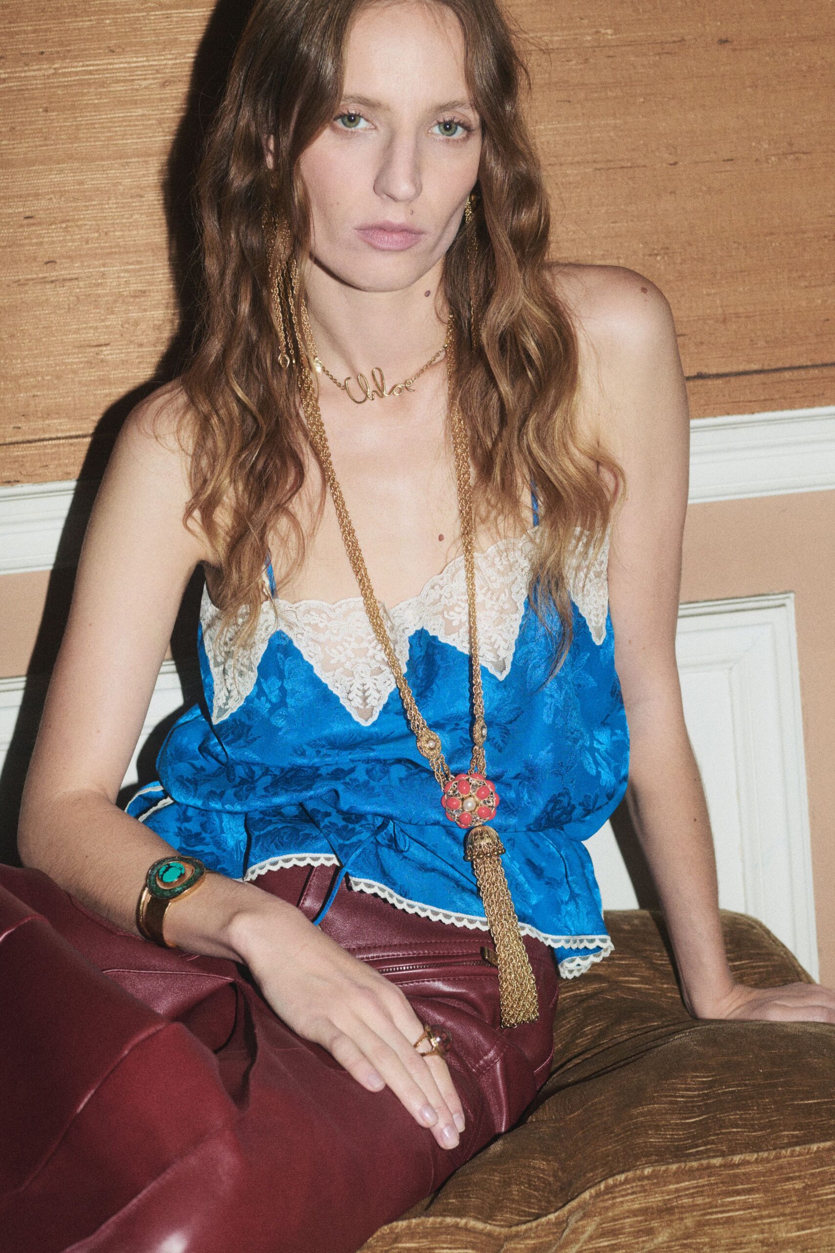 blue silk sleeveless v-neck fitted ruffled top