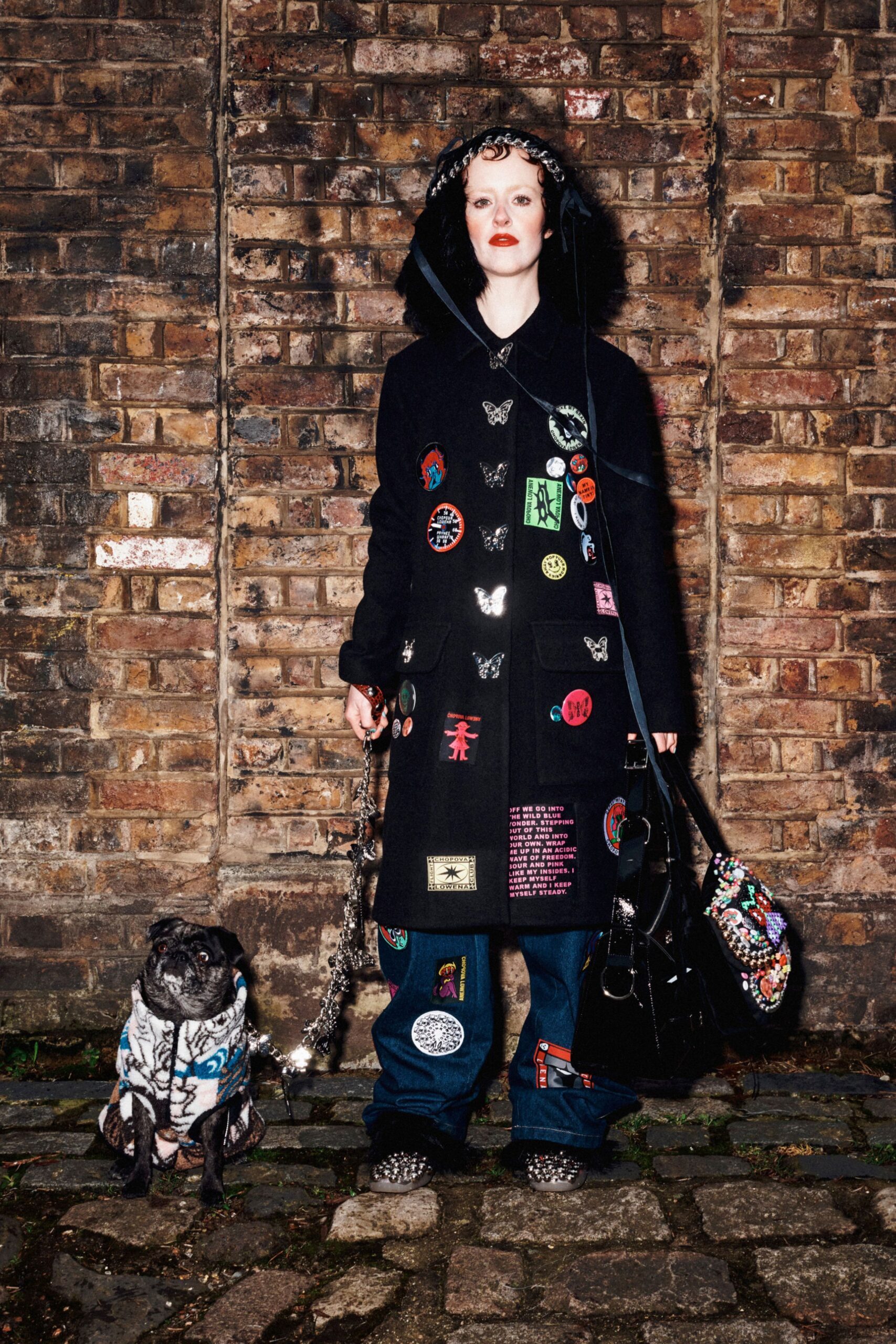 black embroidered coat with denim pants