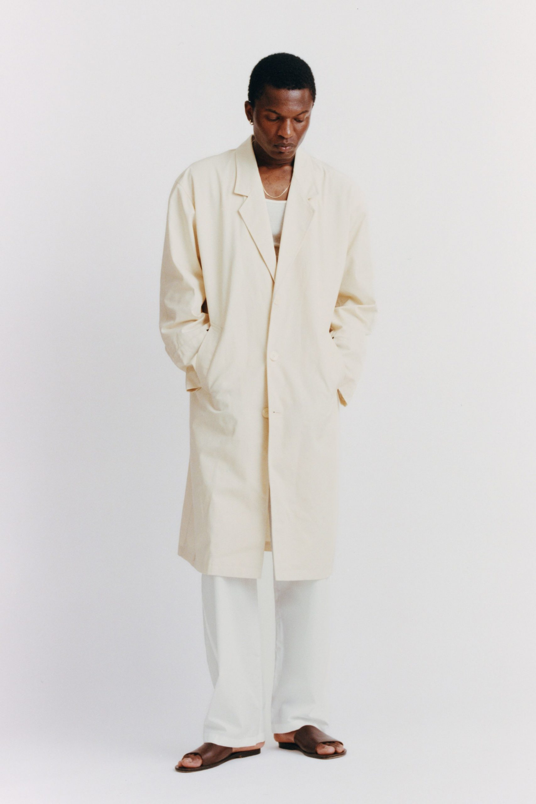 beige coat with white pants