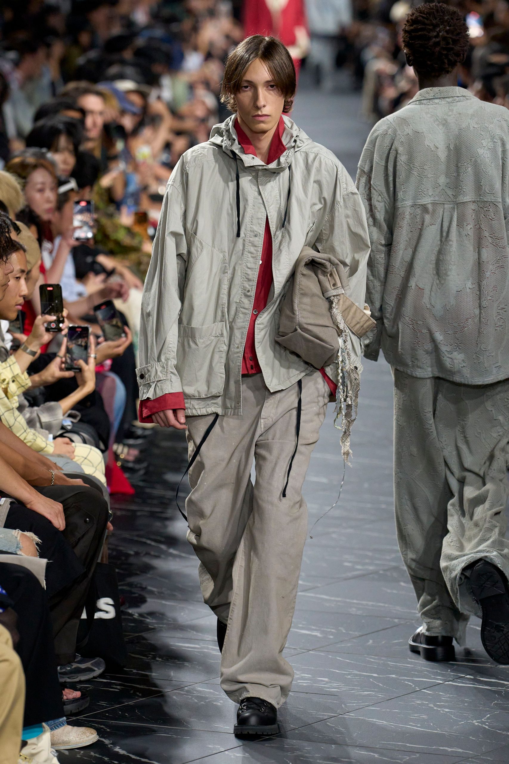 gray jacket red top beige pants