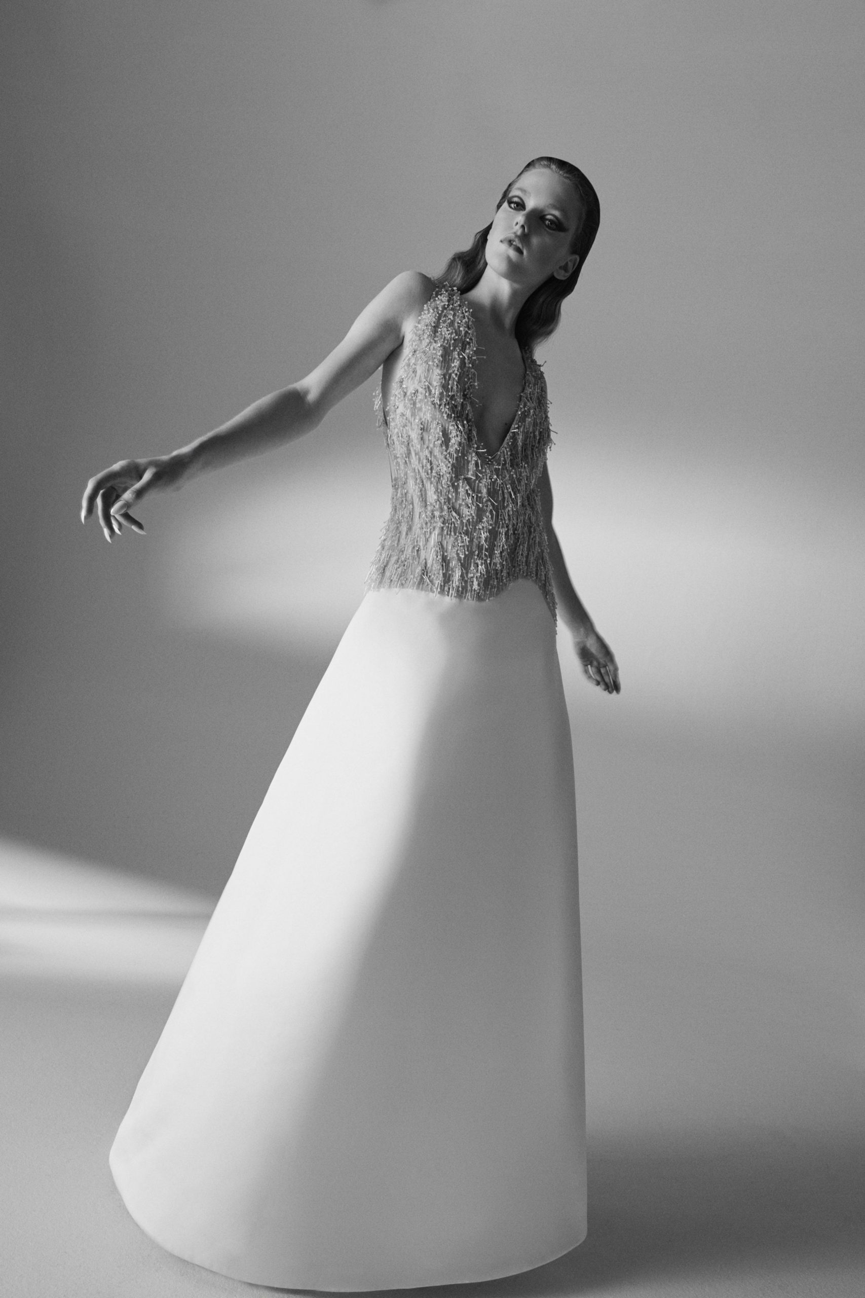 white silk sleeveless gown