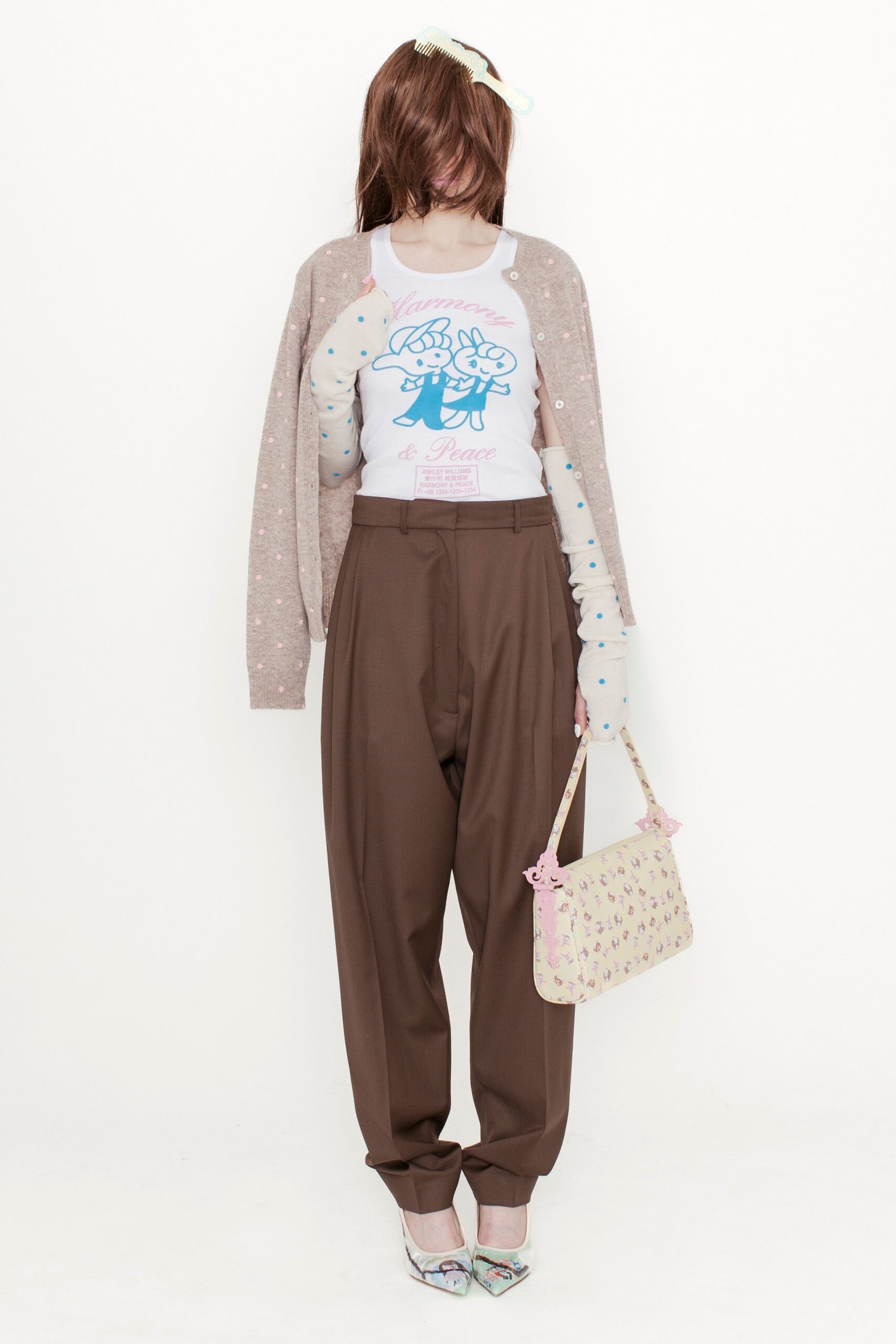 beige cardigan white t-shirt brown pants