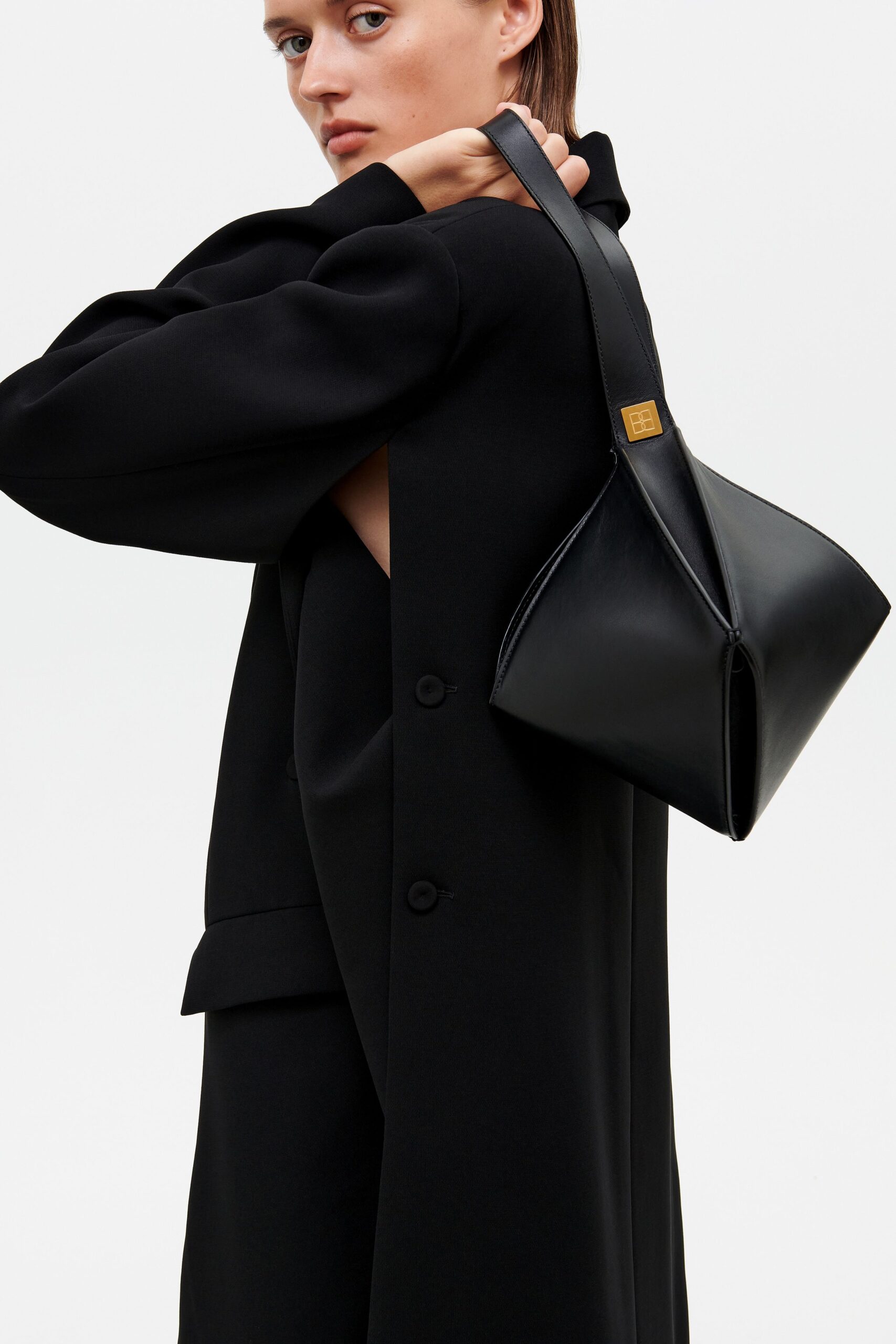 black relaxed coat with bag