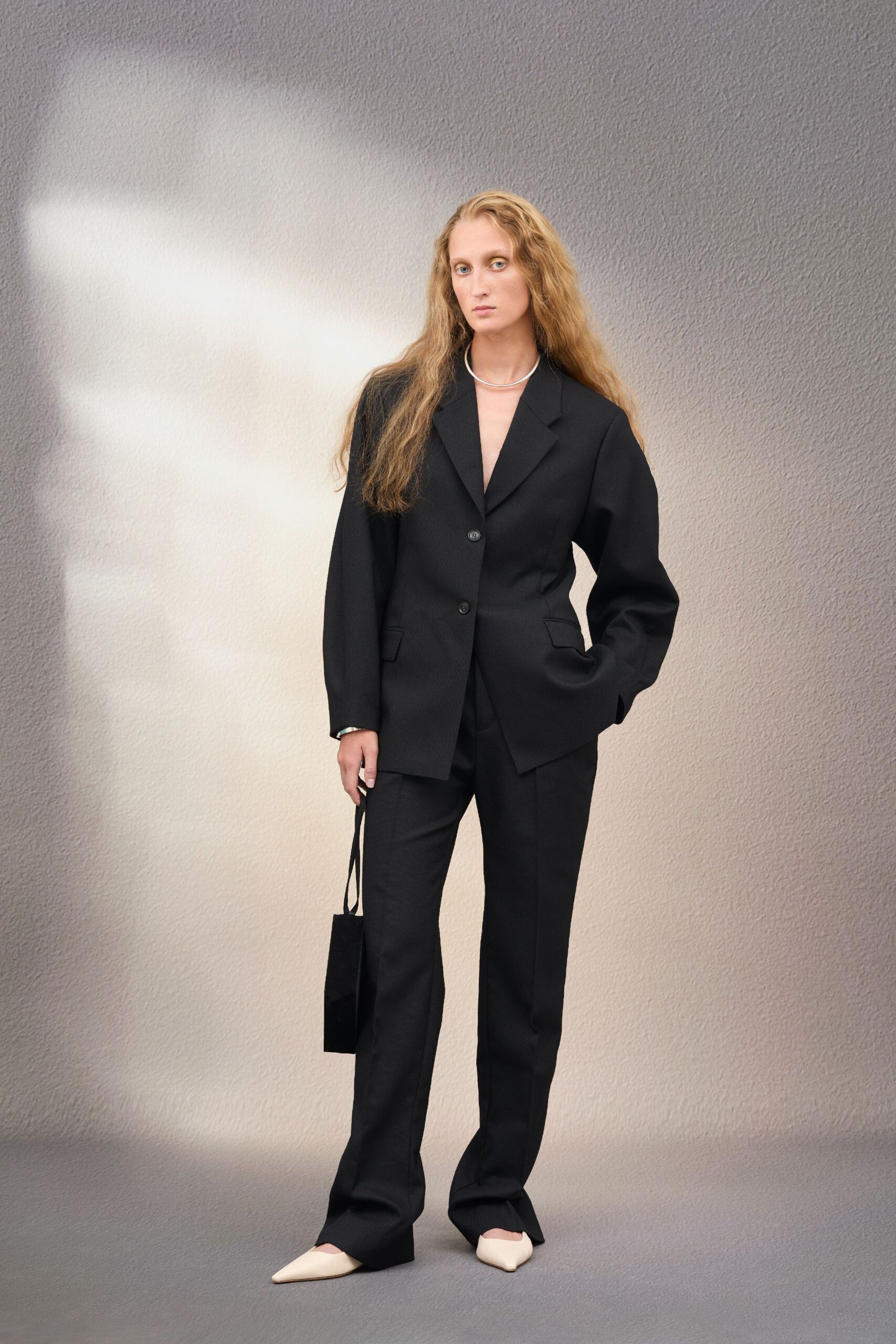 black oversized blazer with tailored pants