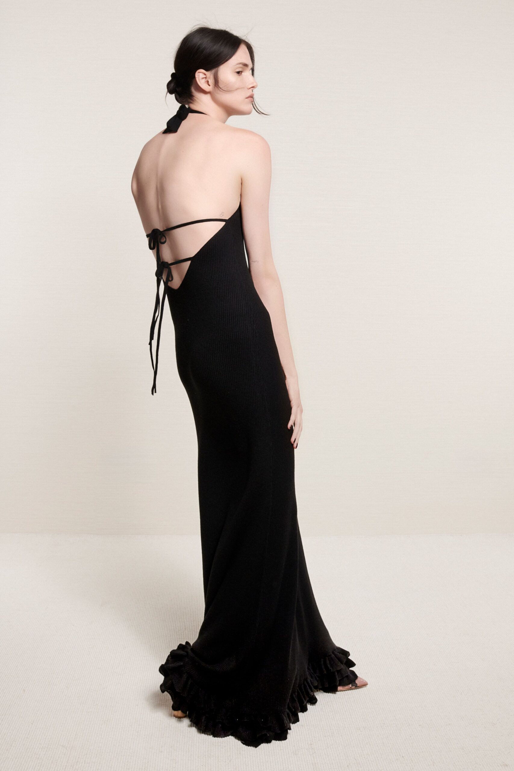 black fitted backless gown