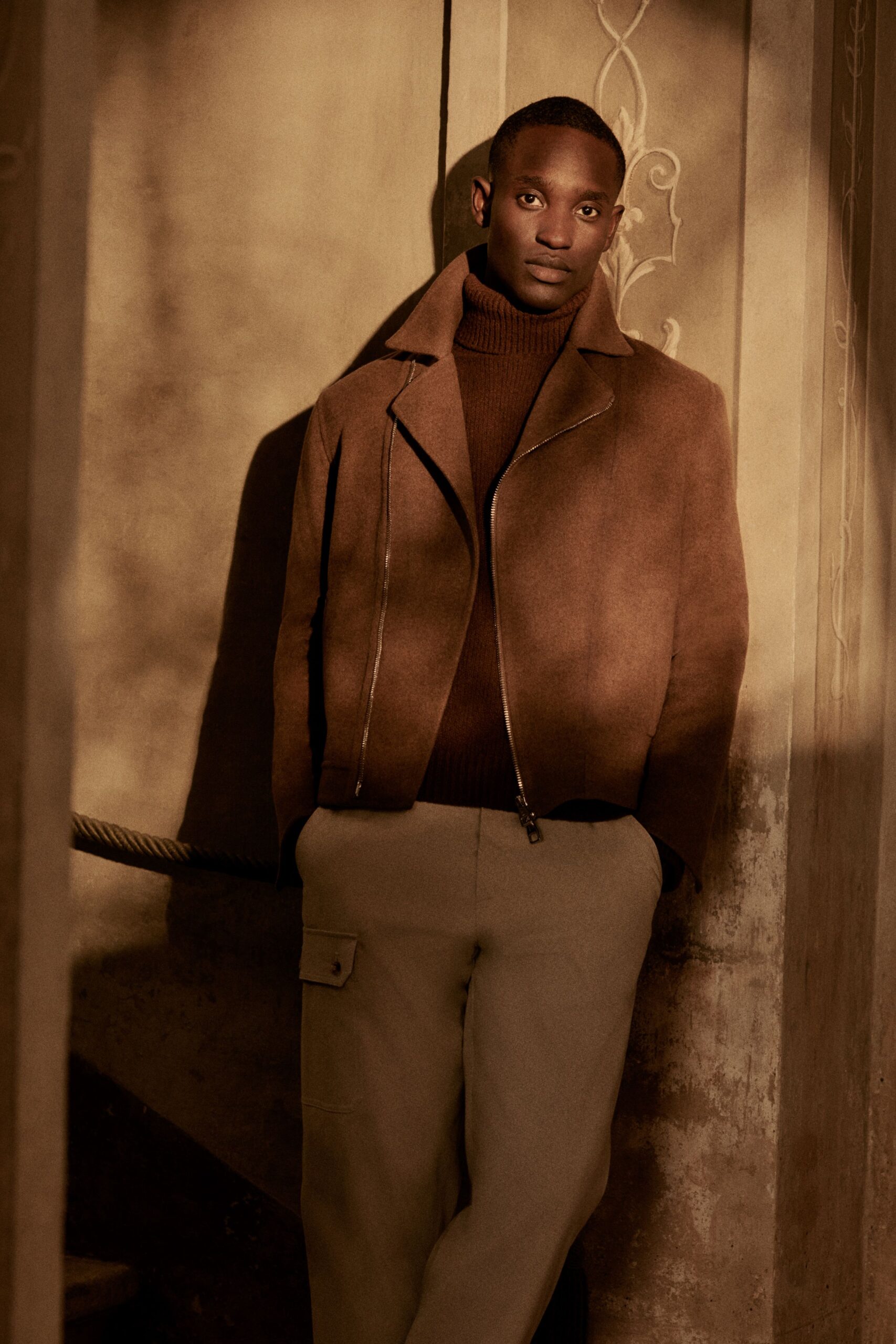 brown leather jacket with sweater