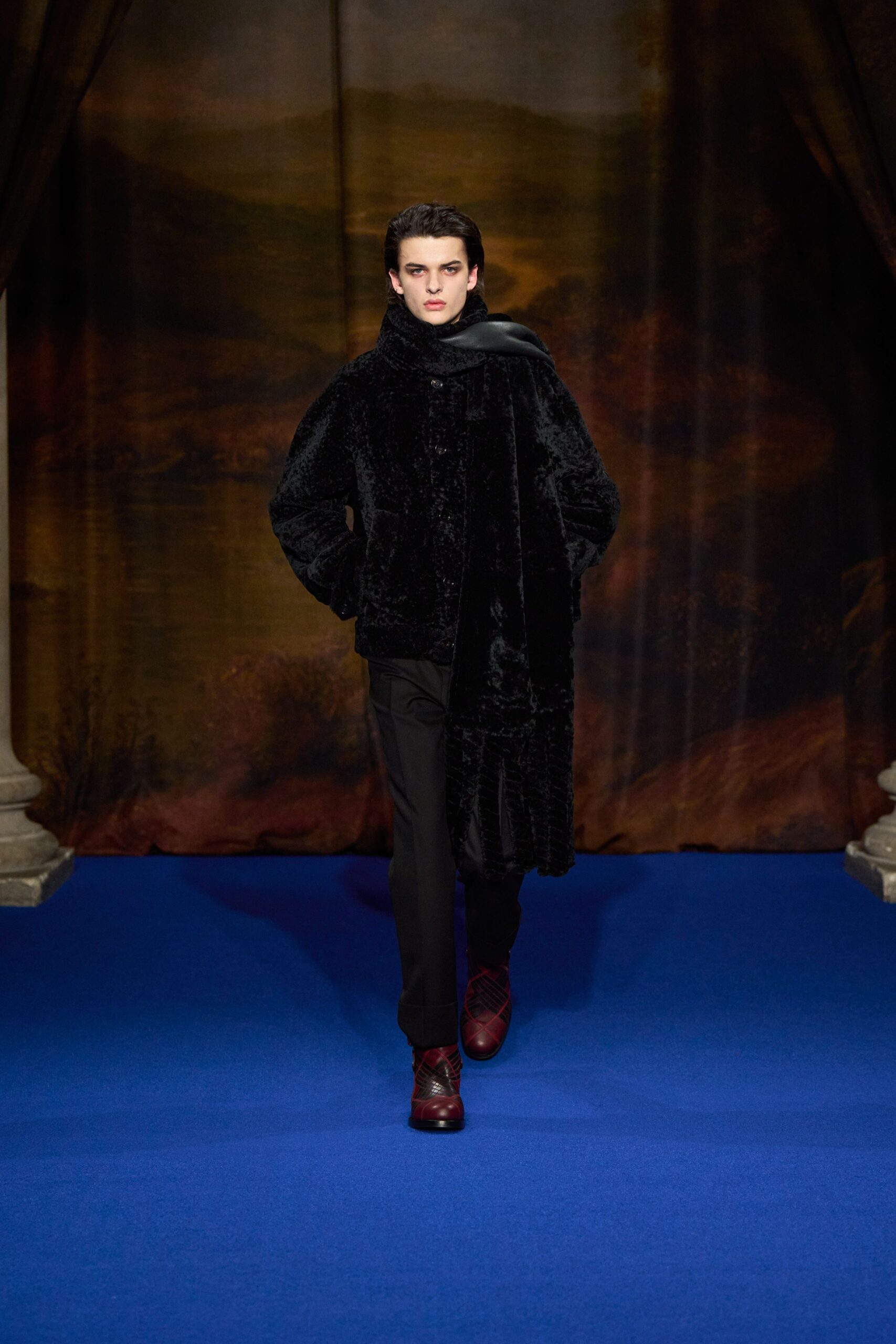 black faux-fur coat with slim pants