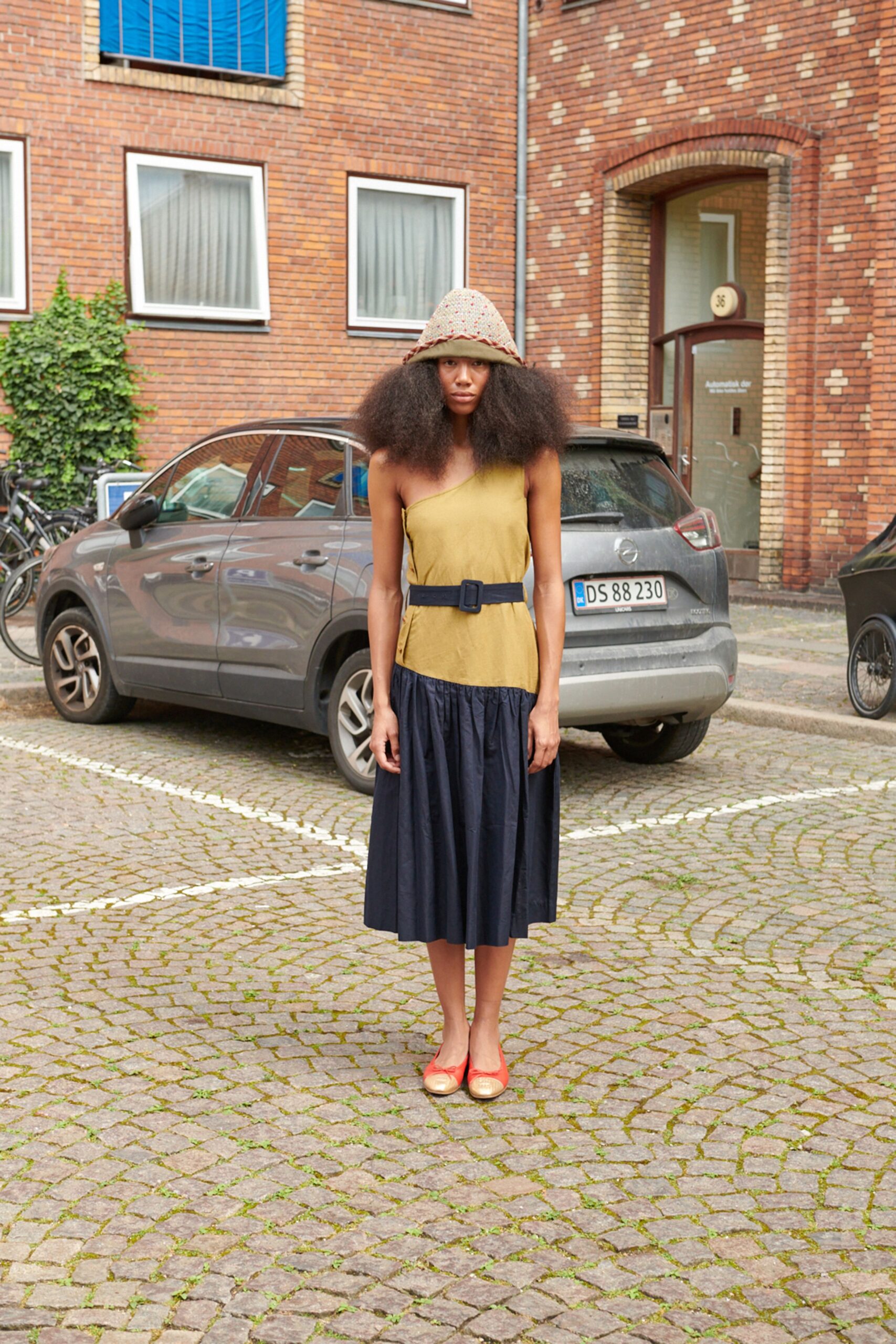 yellow cotton sleeveless collared fitted pleated belted dress