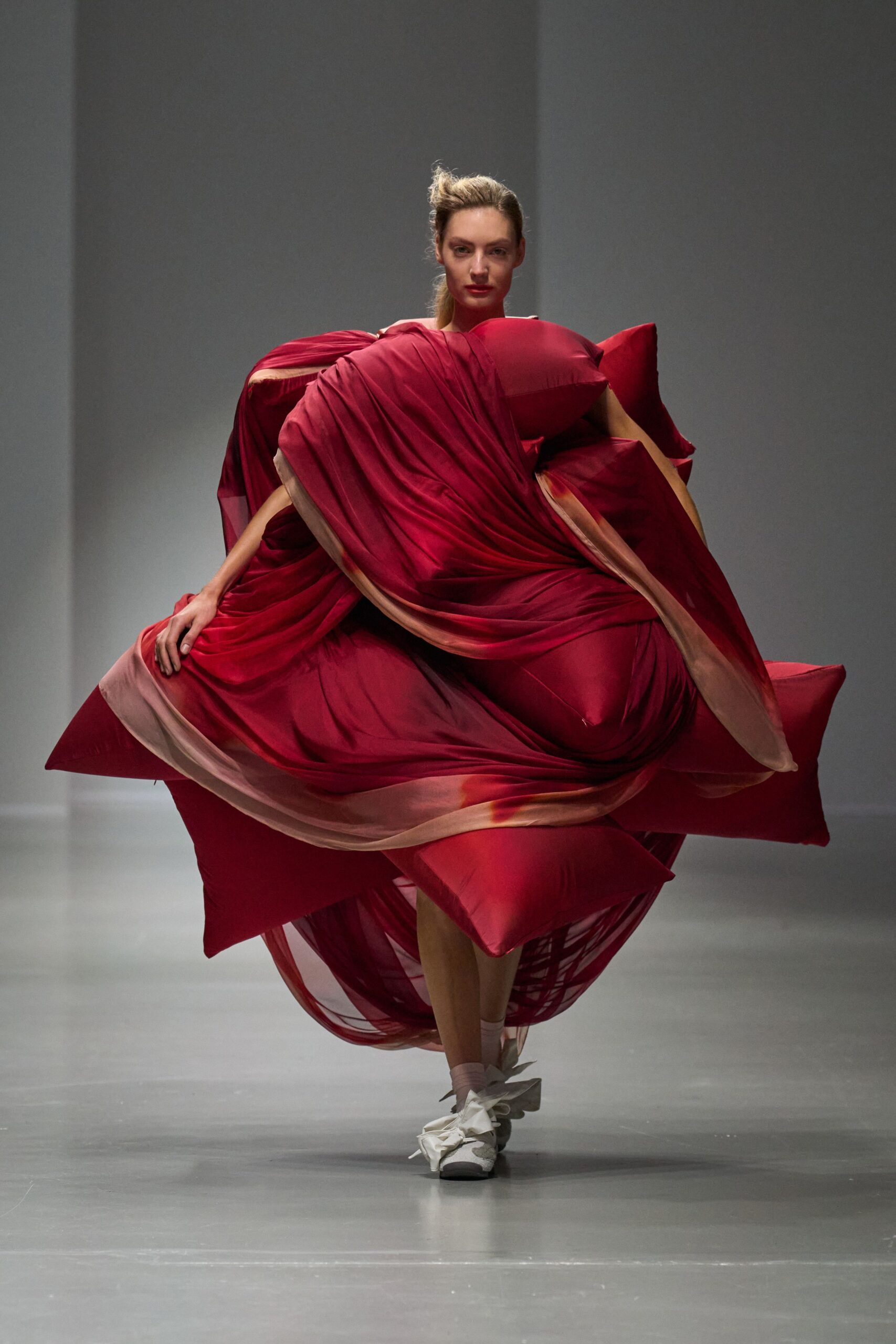 red draped maxi dress with white shoes