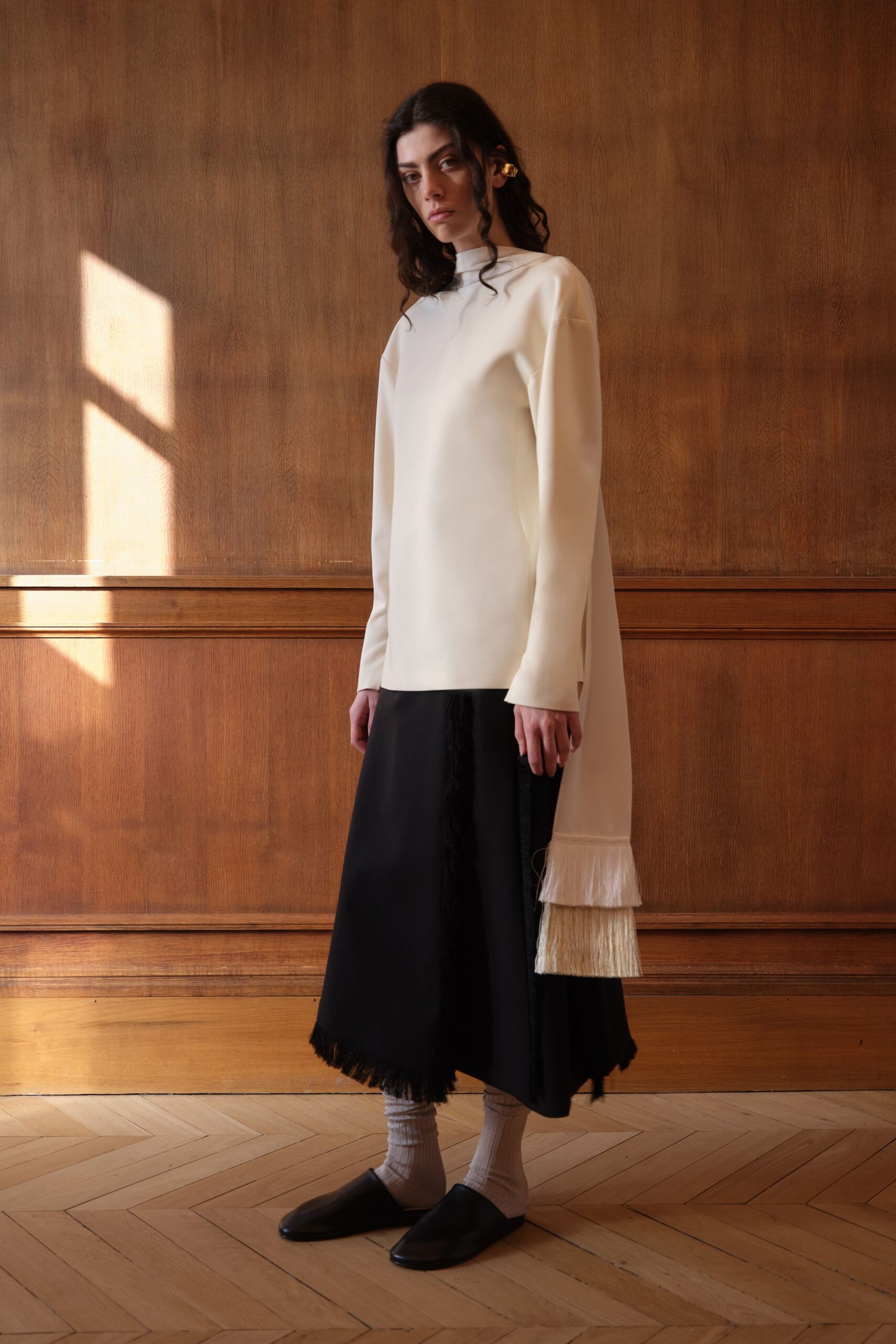 white relaxed top black midi skirt
