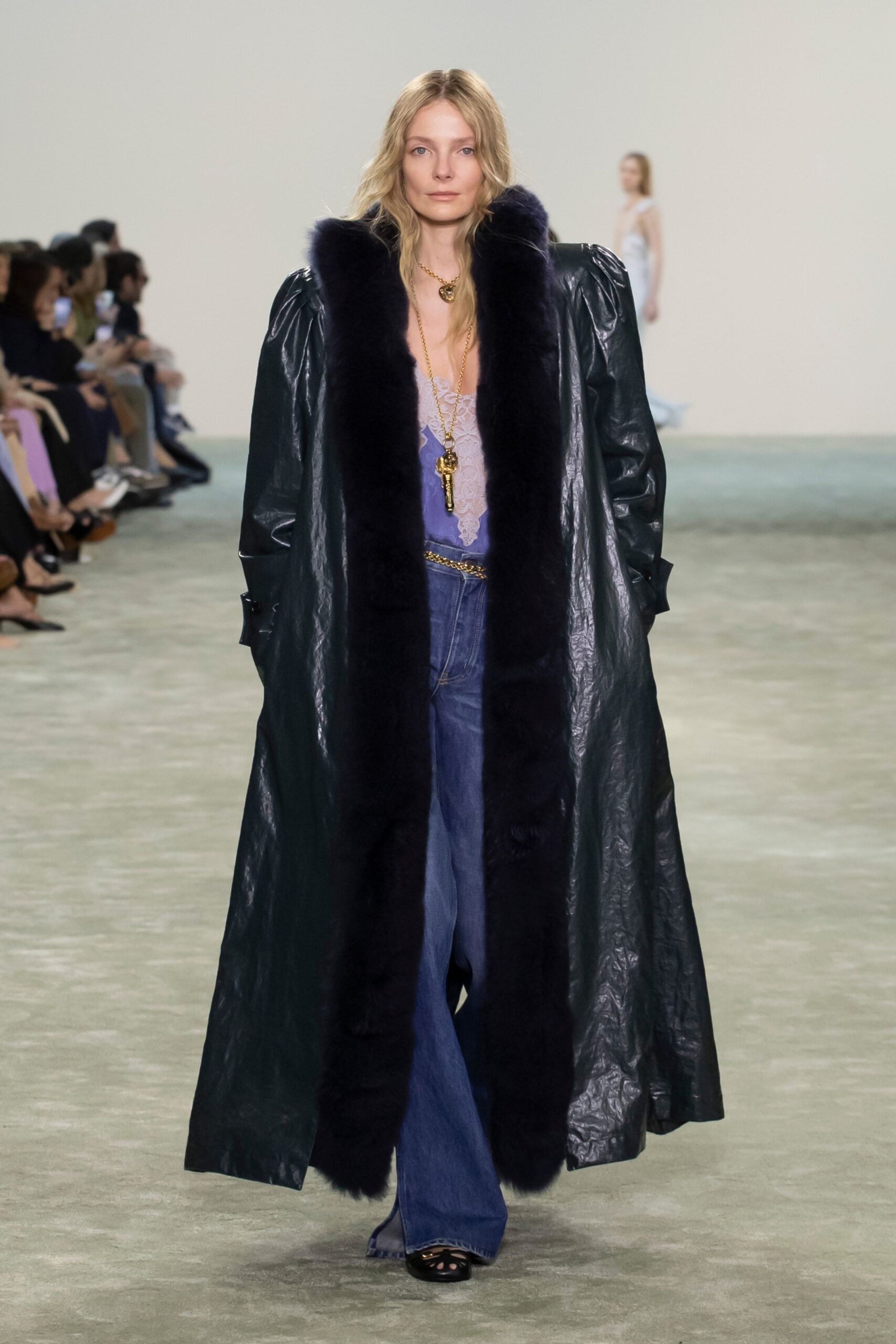 black leather coat with purple top