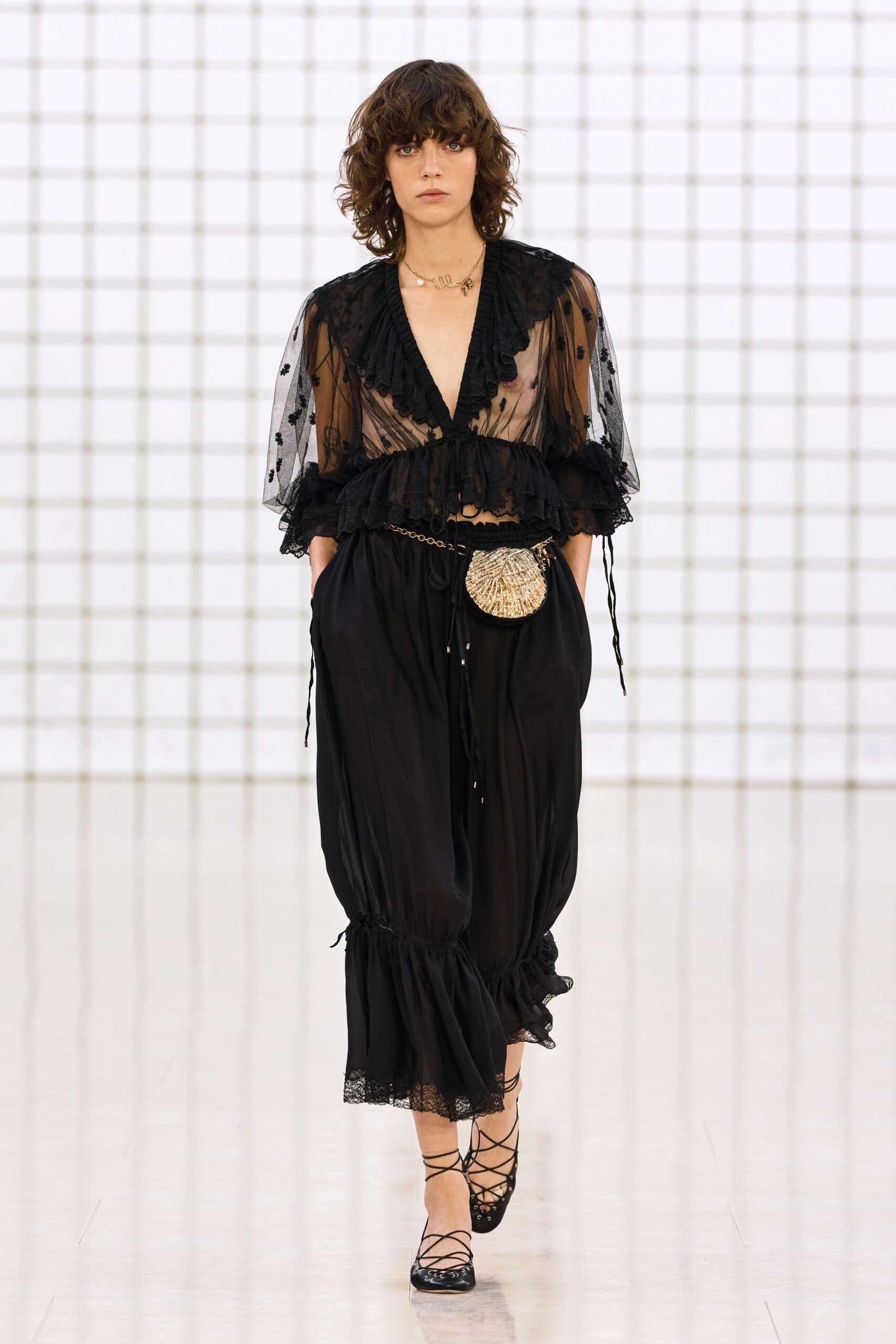 black chiffon top with silk pants