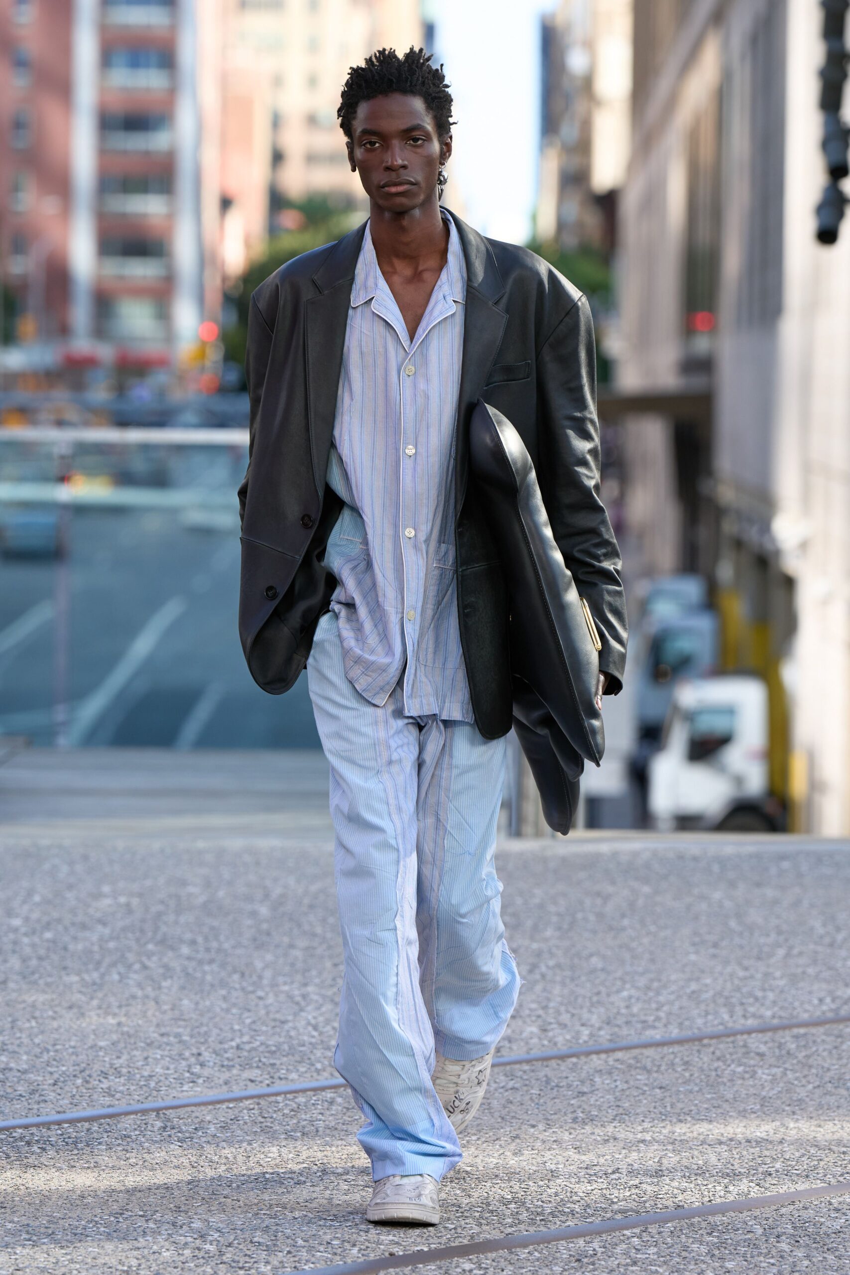 black leather blazer with striped shirt and pants