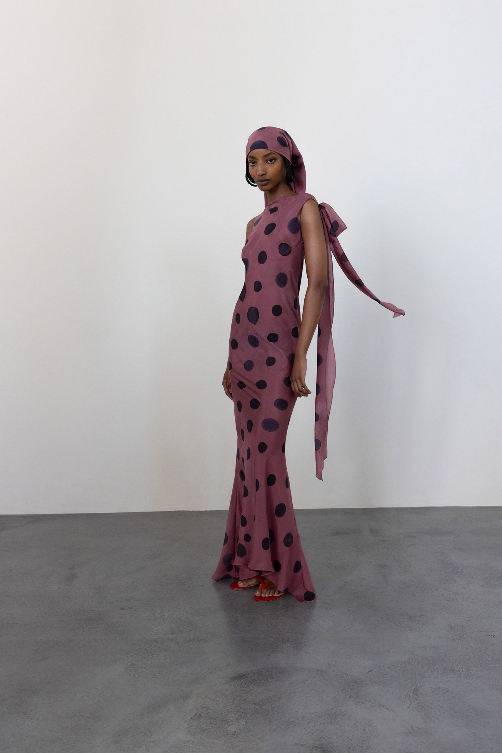 pink polka-dot gown with headscarf