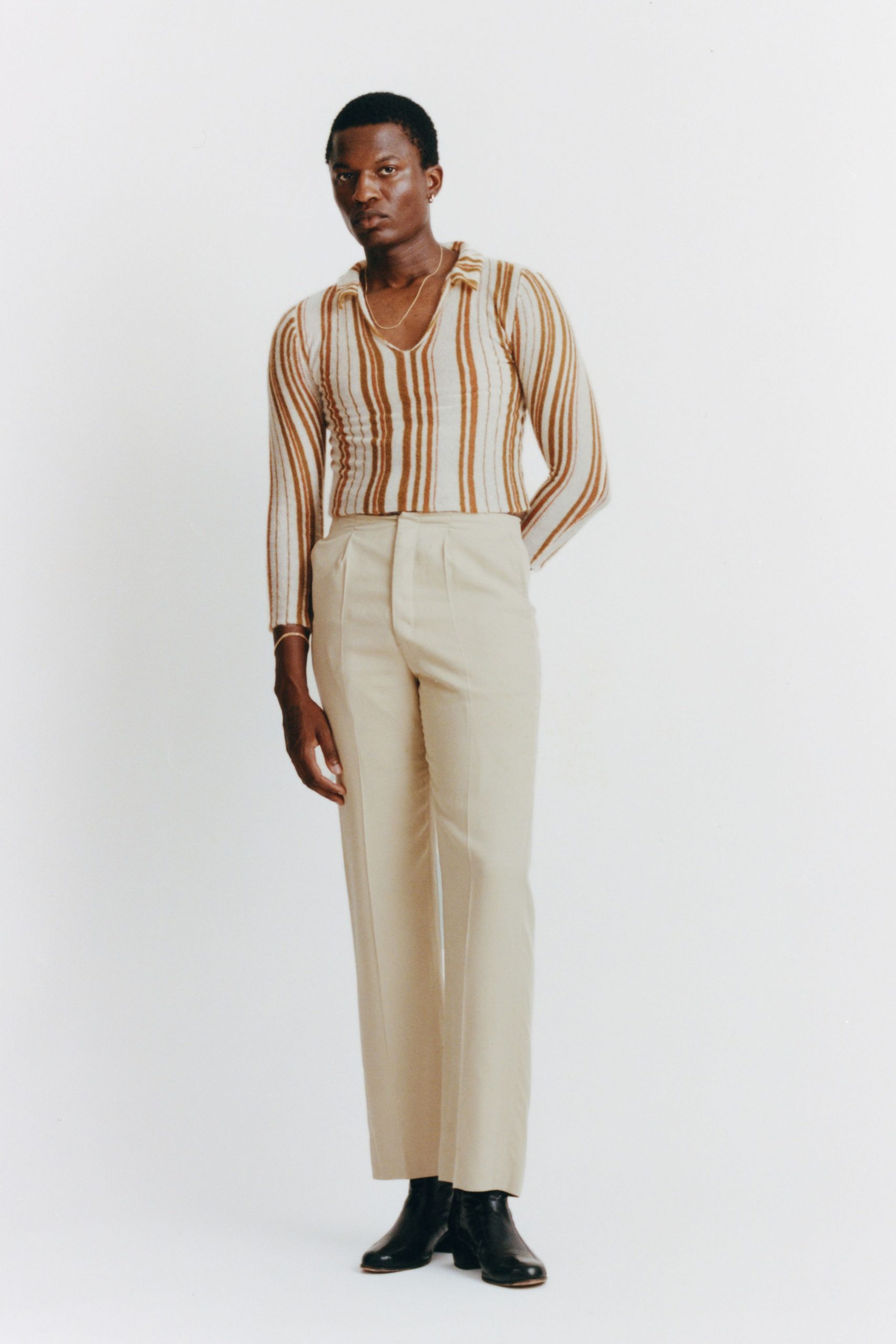 beige striped top with tailored pants